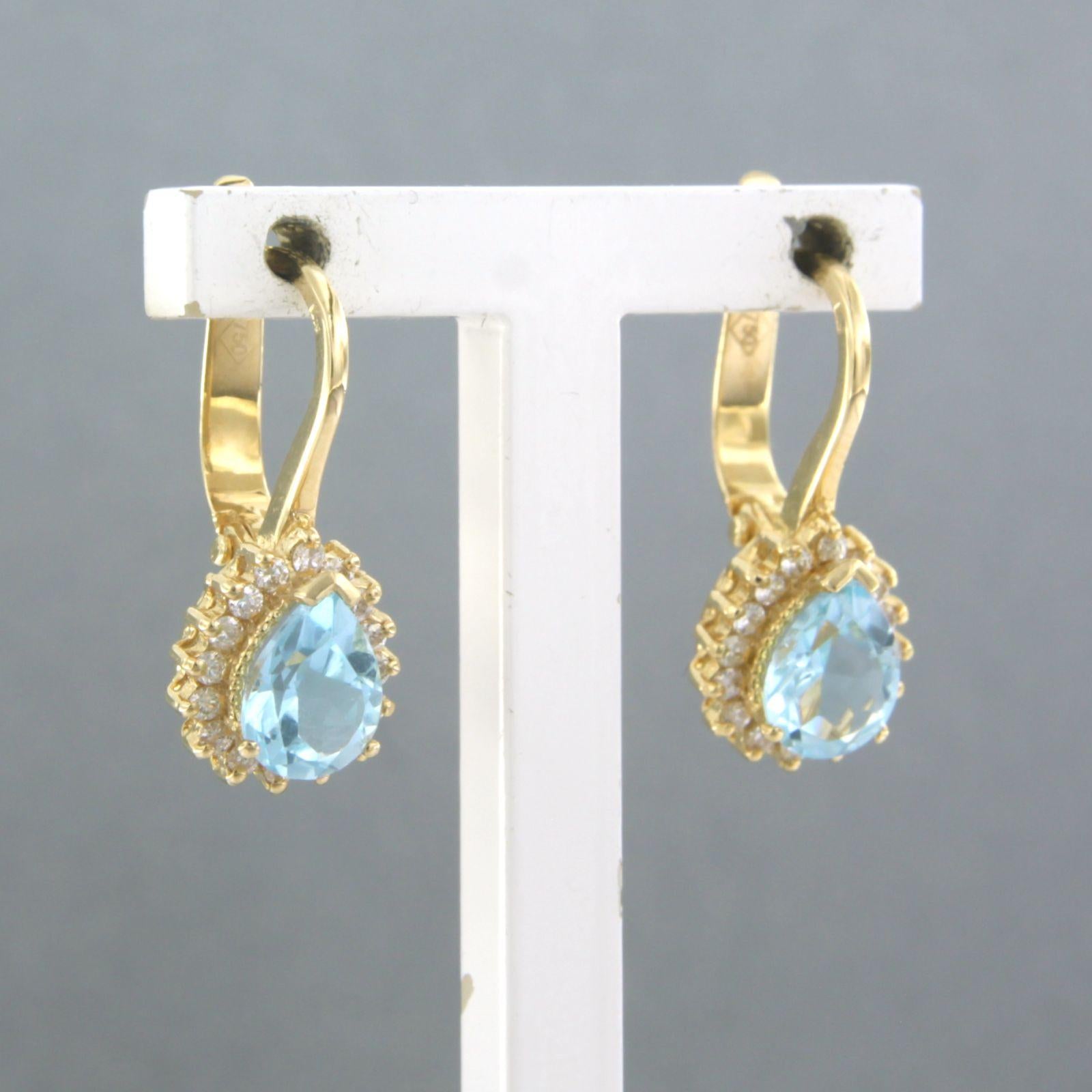 Boucles d'oreilles avec topaze et diamants taille brillant jusqu'à 0,30ct Or jaune 18k en vente 1
