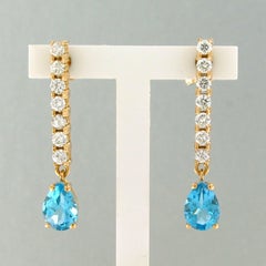 Earrings with topaz and brilliant cut diamonds up to 0.50ct 18k gold 3.3 grams