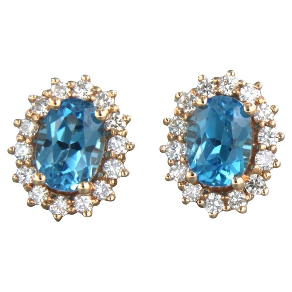 Earrings with topaz and brilliant cut diamonds up to 0.52ct 18k pink gold