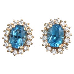 Boucles d'oreilles avec topaze et diamants taille brillant jusqu'à 0,52ct Or rose 18k