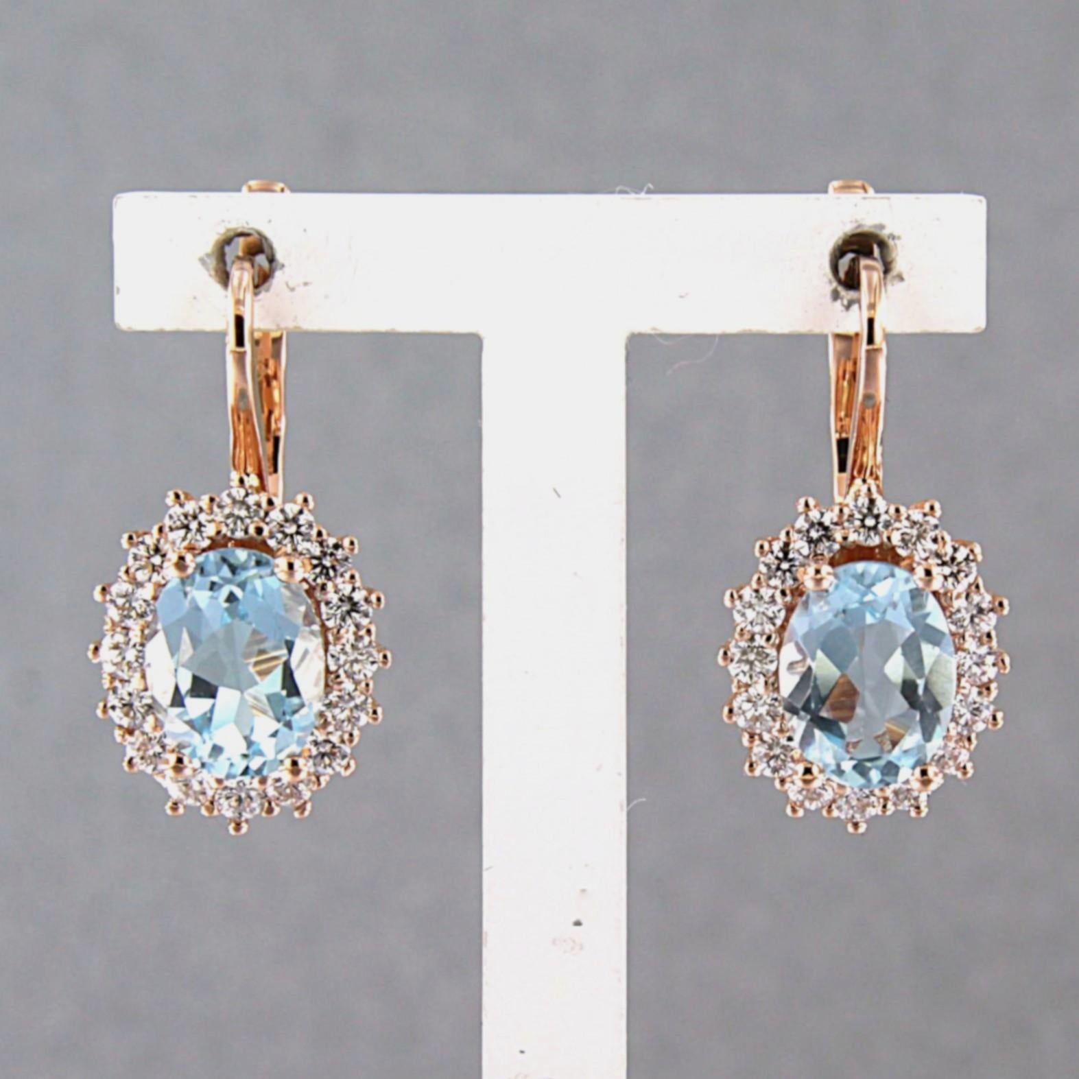 Boucles d'oreilles en or rose 18k serties de topaze tot. 3,00 ct et diamant taille brillant jusqu'à 0,60 ct - F/G - VS/SI

description détaillée :

Les boucles d'oreilles mesurent 2,0 cm de long et 1,0 cm de large.

poids : 5,5 grammes

occupés avec
