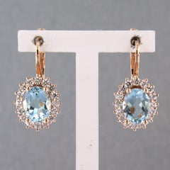 Earrings with topaz and brilliant cut diamonds up to 0.60ct 5.5 grams 18k gold