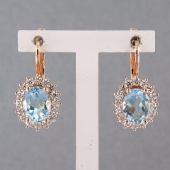 Ohrringe mit Topas und Diamanten im Brillantschliff bis zu 0,60ct 5,5 Gramm 18k Gold