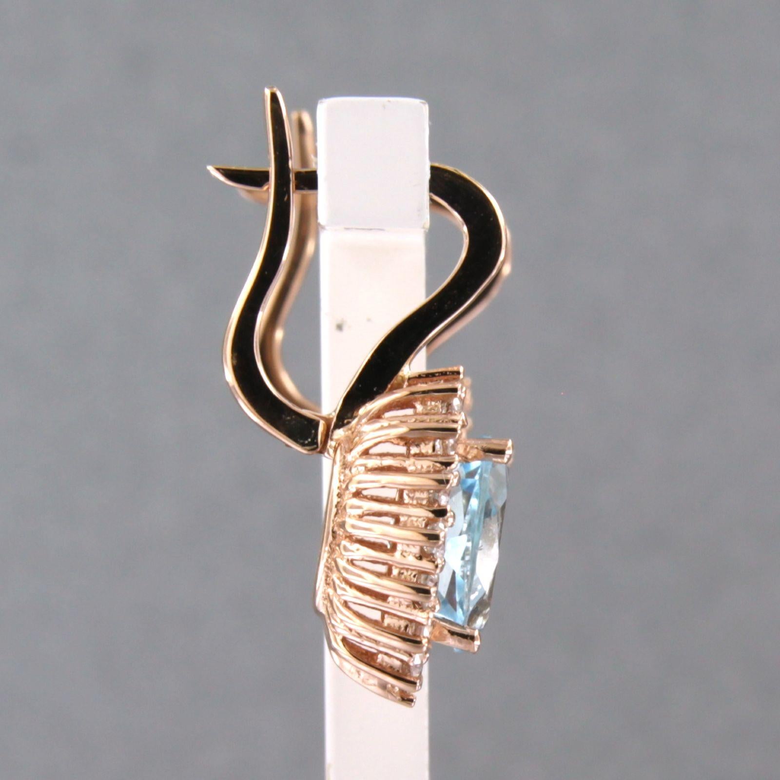Moderne Boucles d'oreilles avec topaze et diamants taille brillant jusqu'à 0,60ct 5,5 grammes Or 18k en vente