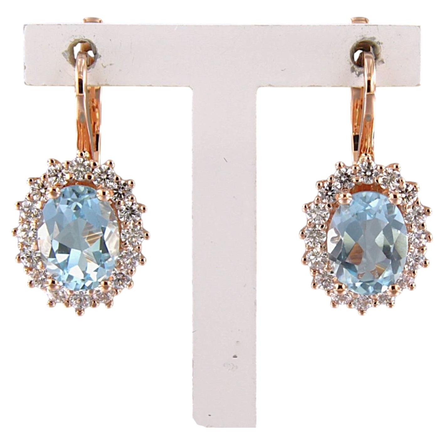 Earrings with topaz and brilliant cut diamonds up to 0.60ct 5.5 grams 18k gold
