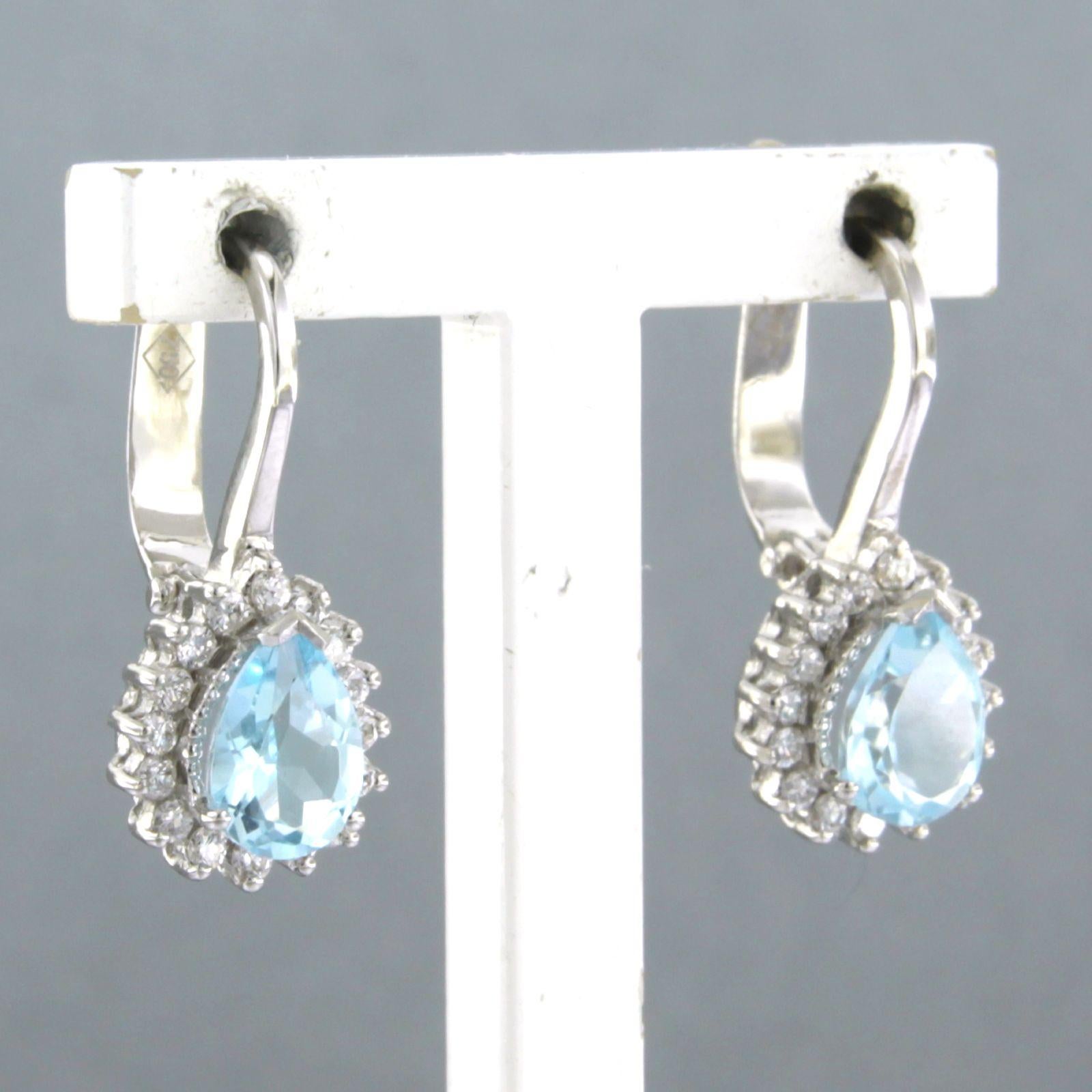 Brilliant Cut Earrings with Topaz and Diamond 18k white gold For Sale
