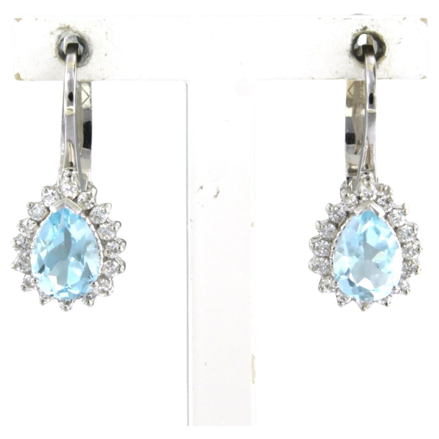 Earrings with Topaz and Diamond 18k white gold