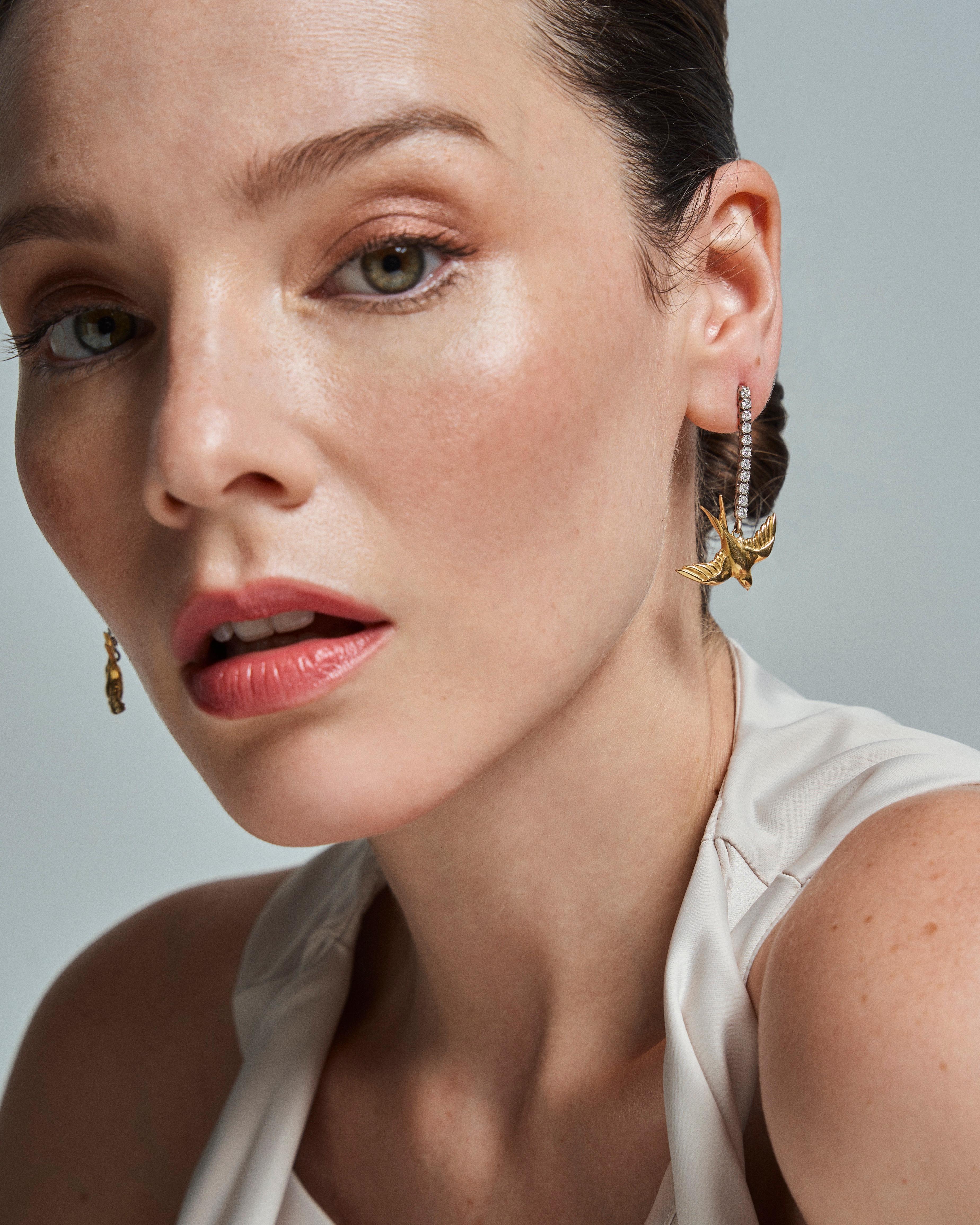 Modern Earrings Yellow 18 Karat Gold White Gold Rivière Diamonds Swallow For Sale