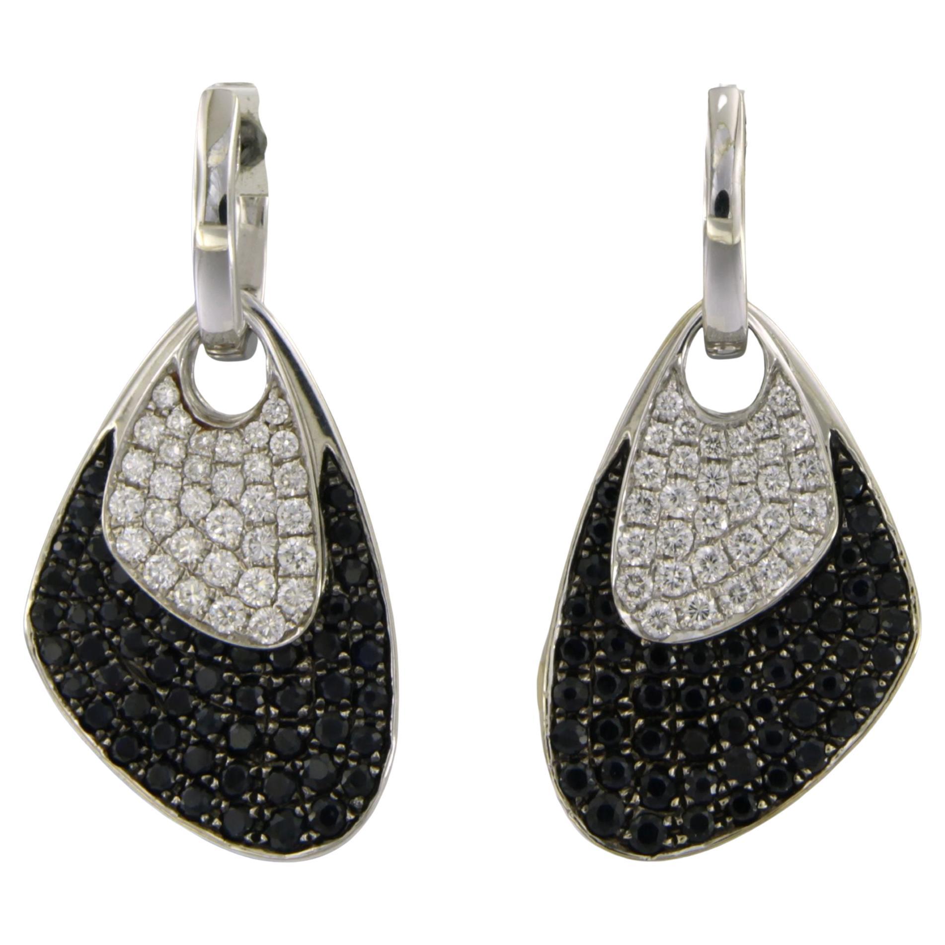 Ohrringe mit Saphiren und Diamanten im Brillantschliff bis zu 0,60ct 18k Gold 10,0 Gramm