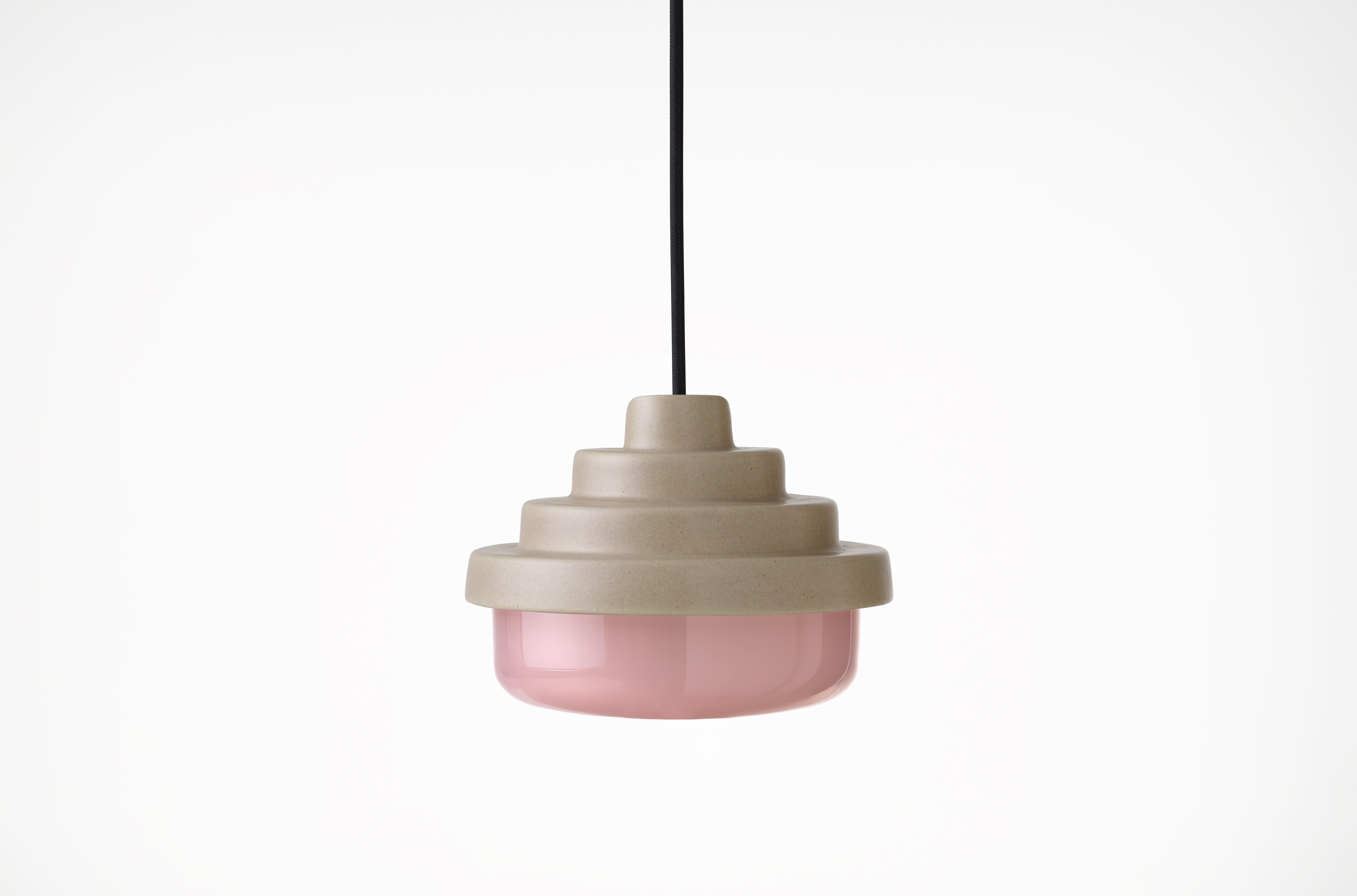 Earth and Pink Honey Pendant Light by Coco Flip
Dimensions: D 18 x W 18 x H 13 cm
Materials: Slip cast ceramic stoneware with blown glass. 
Weight: Approx. 2kg
Glass finishes: Pink.
Ceramic finishes: Earth satin glaze. 

Standard fixtures included
1