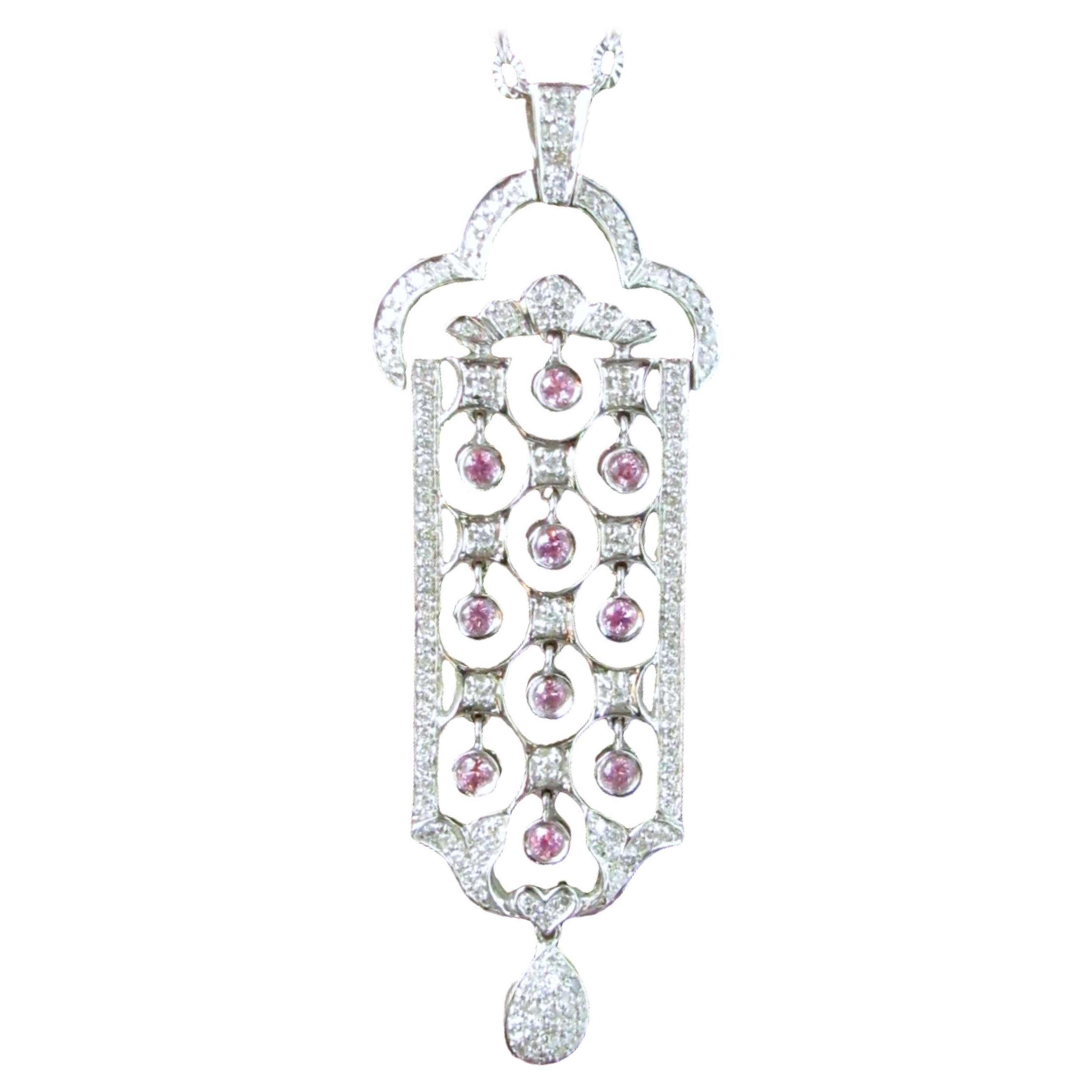 Ciondolo in oro bianco con diamante e tormalina rosa estratti dalla Terra