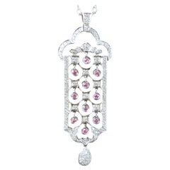 Pendentif en or blanc avec diamants et tourmaline rose extraits de la terre