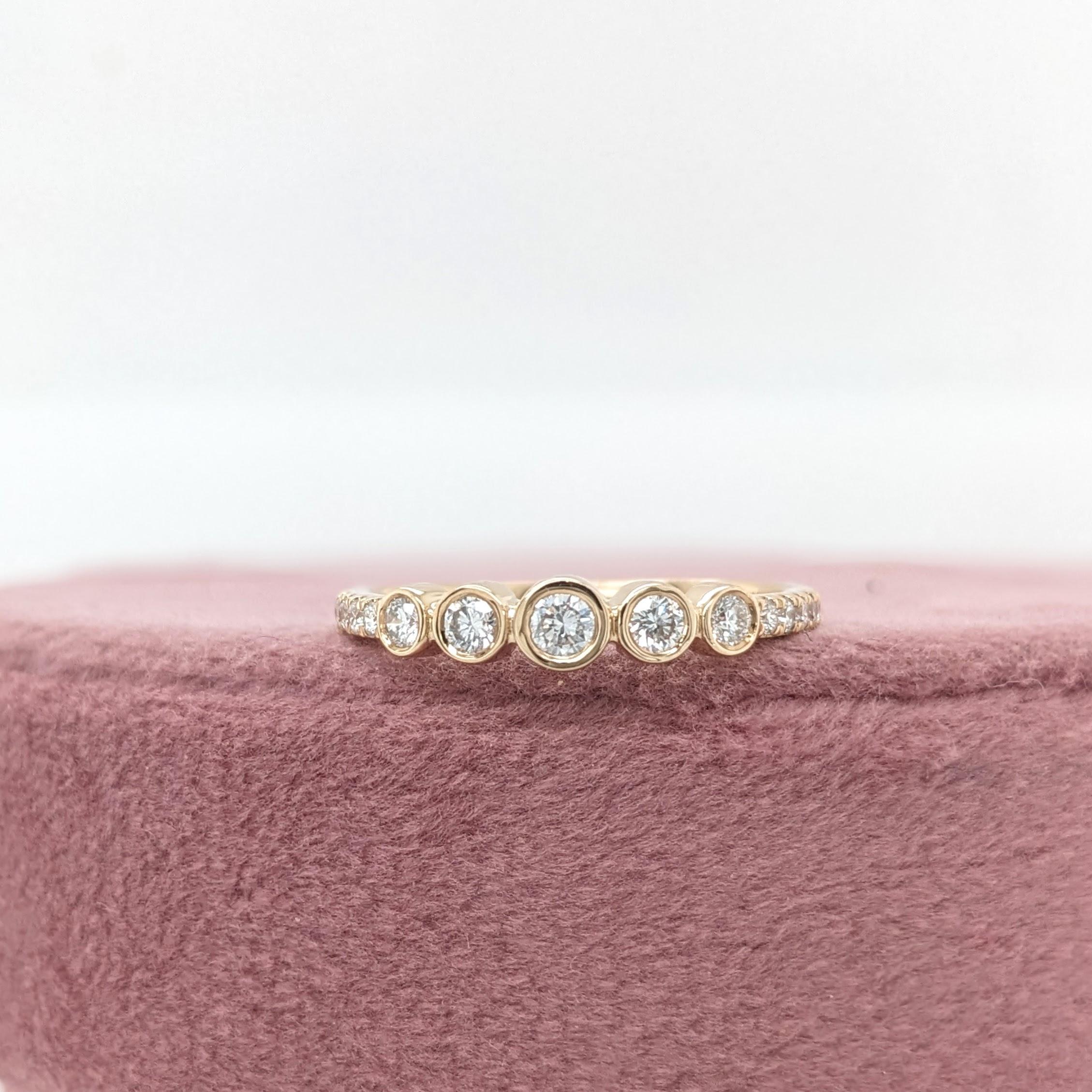 This beautiful bezel set diamond band features 15 natural earth mined diamonds, set in solid 14K gold. This Diamond band makes a lovely April birthstone gift for your loved ones!

Specifications

Item Type: Ring
Center Stone: Diamond
Treatment: