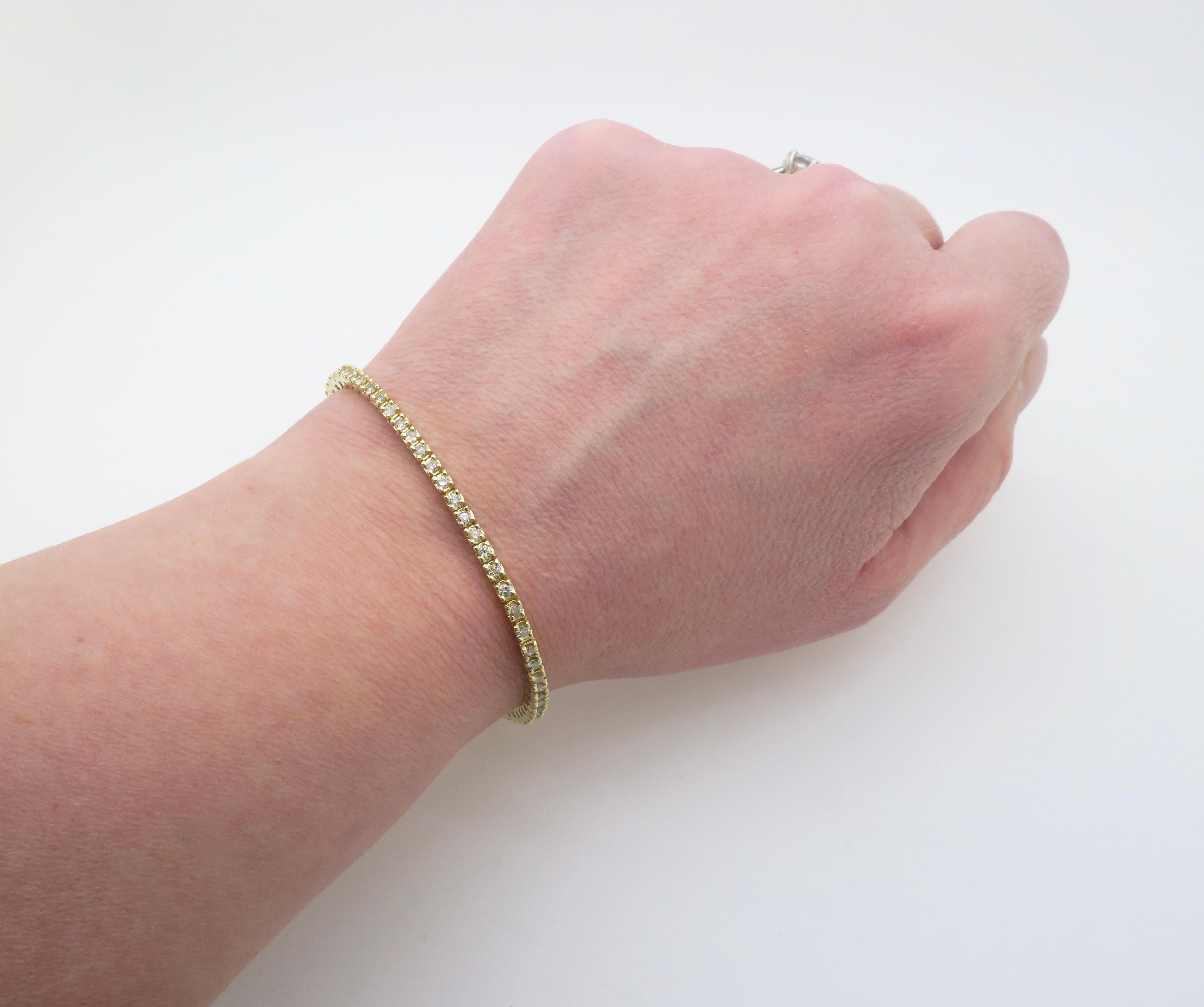 Classic diamond line bracelet containing 2.04ctw of Round Brilliant Cut Diamonds. 

Gemstone: Earth Mined Diamond 
Diamond Carat Weight: 2.04CTW 
Diamond Cut: Round Brilliant Cut 
Color: G-I
Clarity: SI1-I2
Metal: 14k Yellow gold 
Marked: Stamped