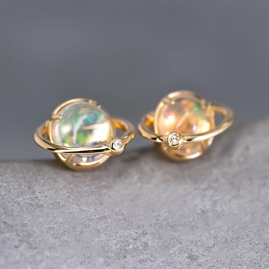 Earth and Moon Design Mexican Fire Opal & Diamond Stud Earrings 18K Yellow Gold.


Free Domestic USPS First Class Shipping! Free Gift Bag or Box with every order!

Opal—the queen of gemstones, is one of the most beautiful gemstones in the world.