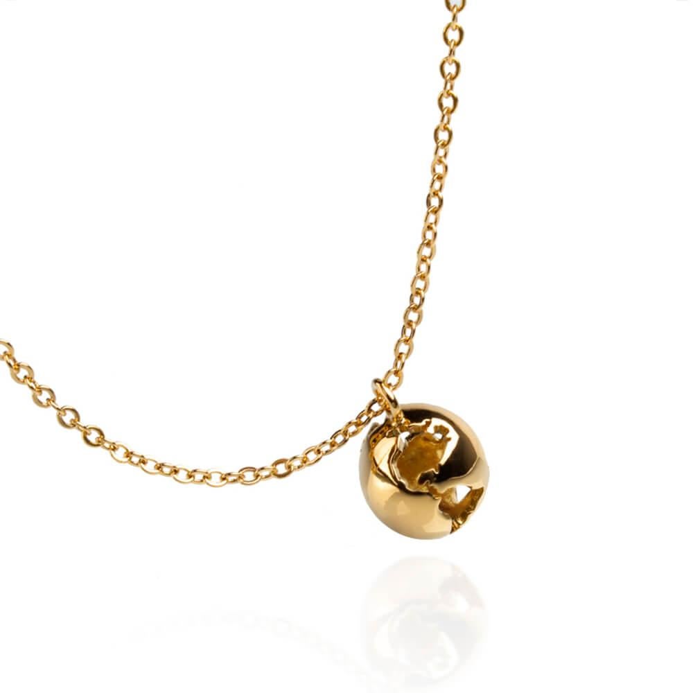 This beautiful Earth Necklace features an intricate design that illustrates a world map, dangles in a delicate chain. Available in two striking finishes — 24K Gold Plated Brass and Rhodium Plated Brass. This classic and elegant necklace is a