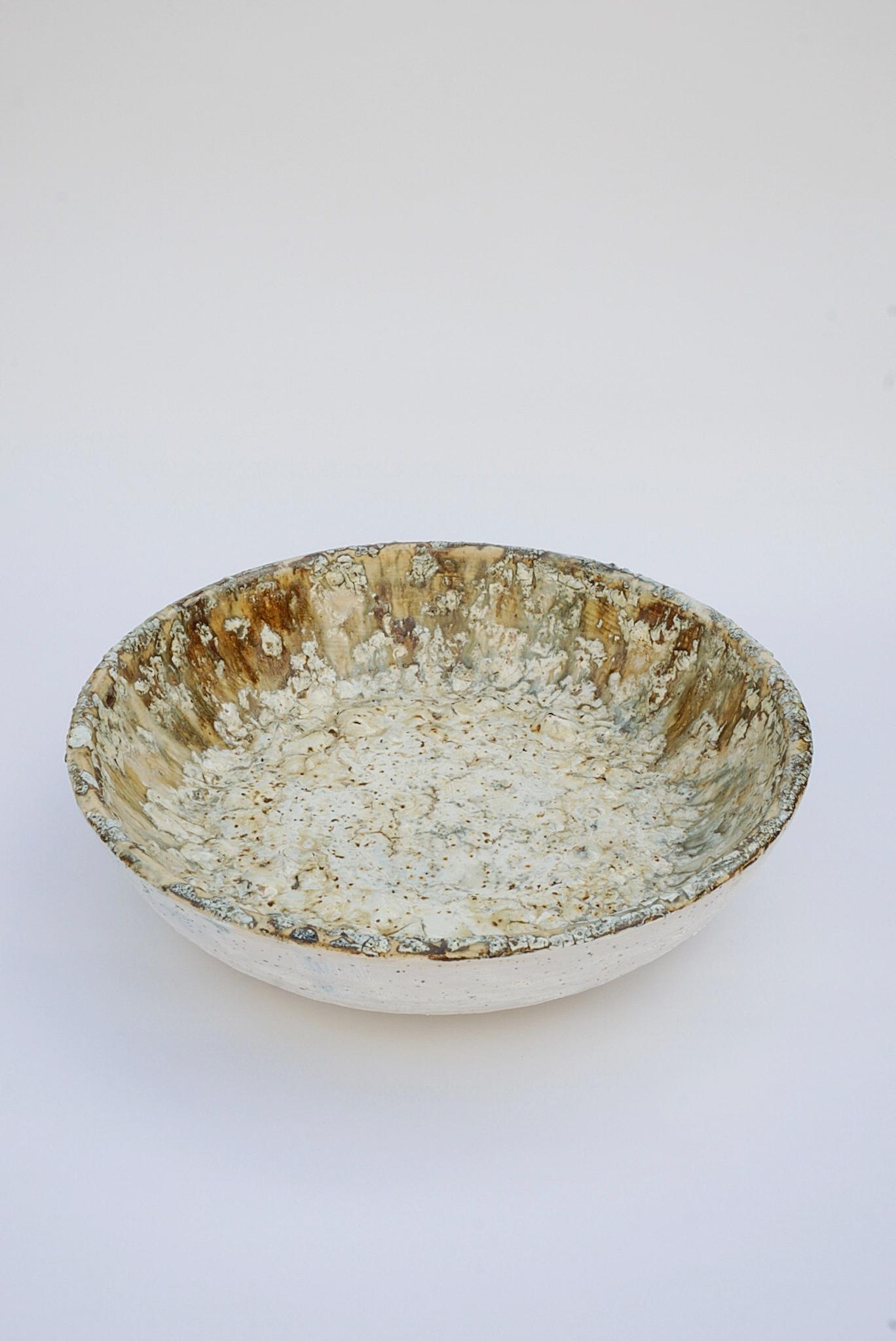 Earth prints bowl by Arina Antonova, 2019
Dimensions: H 10 x D 36 cm
Materials: Stoneware, wild clay, sea weed

Born in Sewastopol (Crimea), I was surrounded by the natural variety of the coastal Black Sea views with rocky beaches and