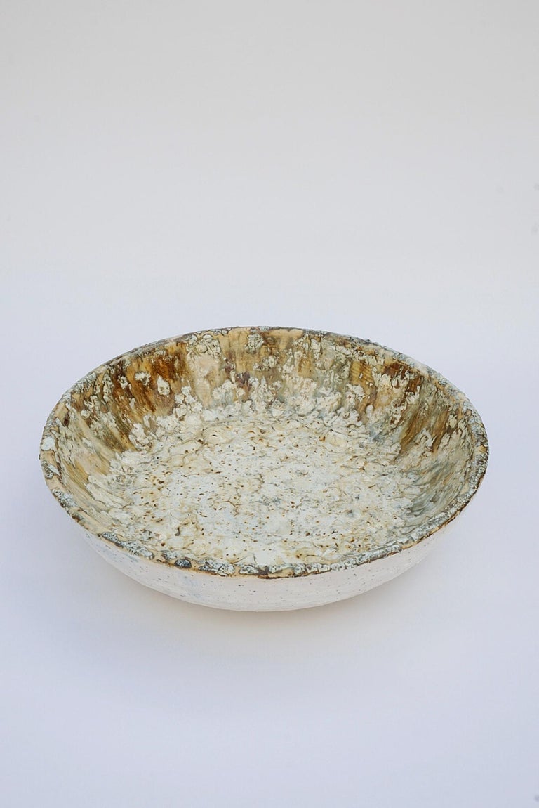 Earth prints bowl by Arina Antonova, 2019
Dimensions: H 10 x D 36 cm
Materials: Stoneware, wild clay, sea weed

Born in Sewastopol (Crimea), I was surrounded by the natural variety of the coastal Black Sea views with rocky beaches and