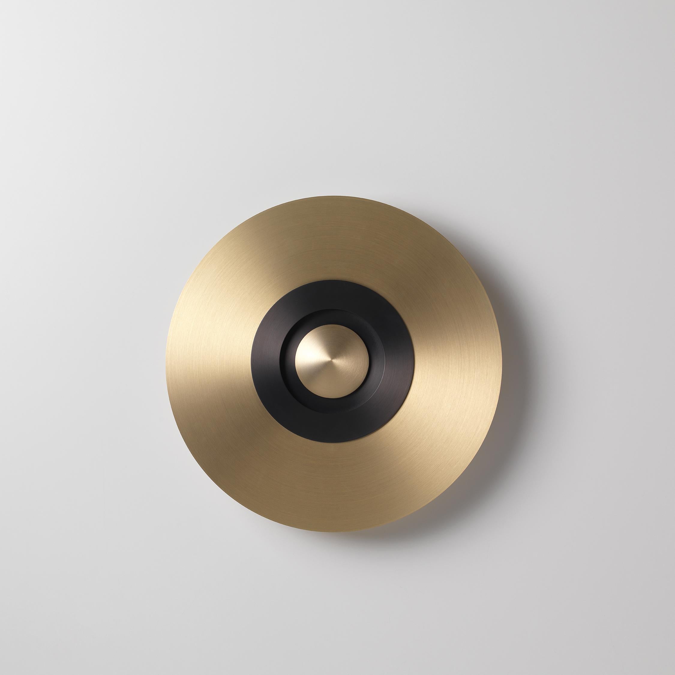 Earth Radian wall light by Emilie Cathelineau
Dimensions: D33 X H5 cm
Materials: Solid brass,Polycarbonate diffuser.
Others finishes and dimensions are available.

All our lamps can be wired according to each country. If sold to the USA it will