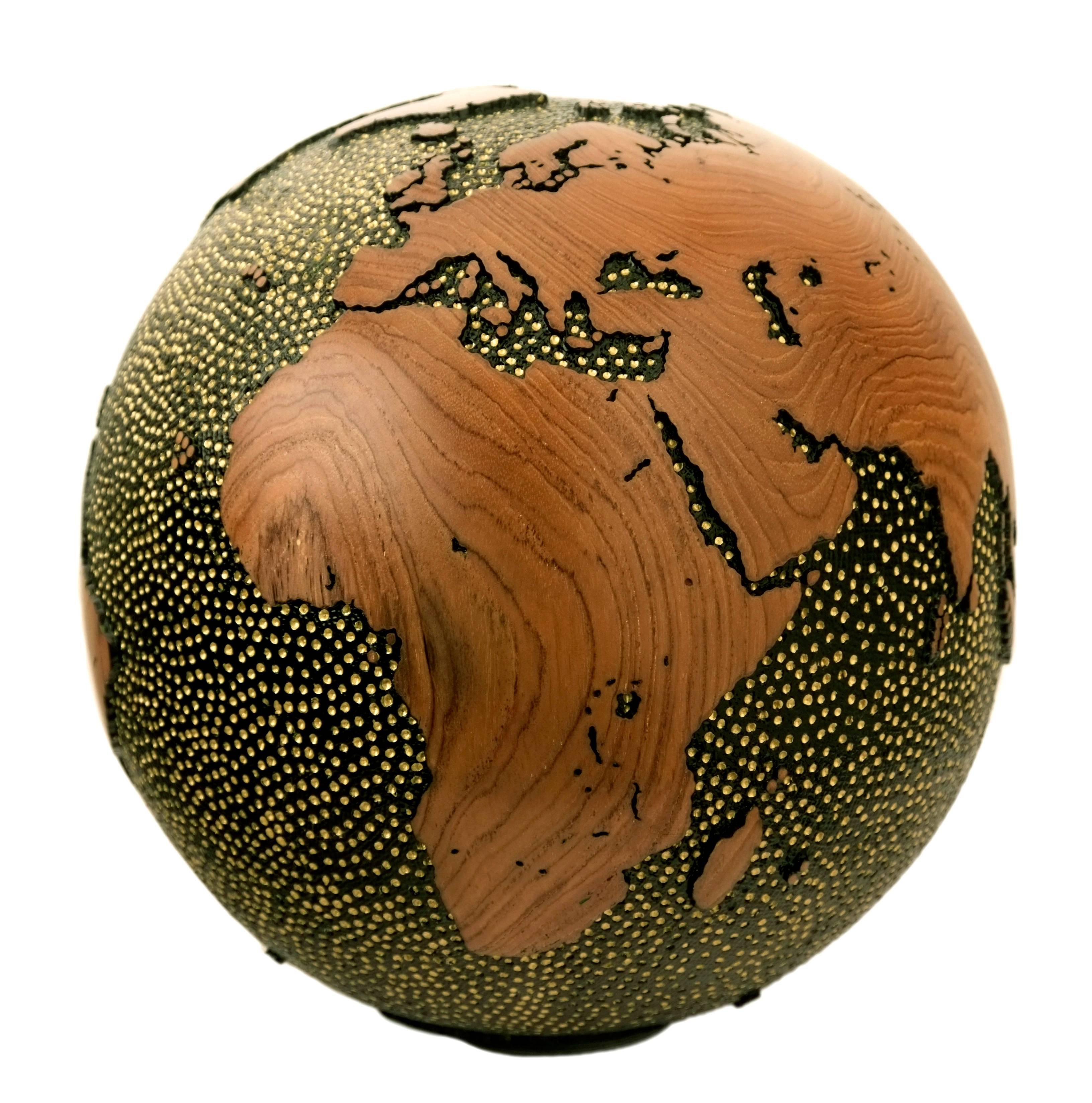 Be humble for you are made of earth
Be noble for you are made of stars.

Hand-carved wooden globe made from reclaimed teak root with copper layer, green vitrail finishing, double hammered / holes and grills textured finishing, holes filled with gold