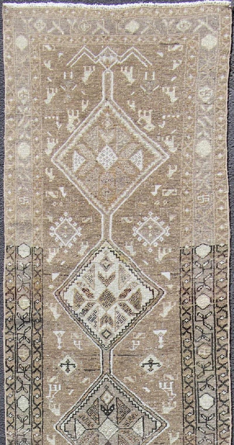 Persian Earth Tone Antique Heriz Runner from Persia with Diamond Tribal Medallions For Sale