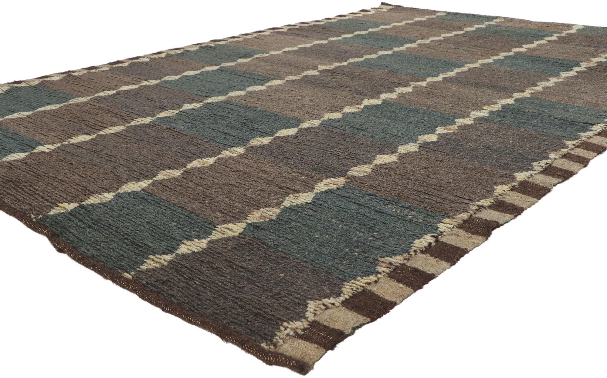 80823 Modern Checkered Moroccan Rug, 06'01 x 08'10.
Masculine appeal meets Midcentury Modern in this hand knotted wool Moroccan style rug. The checkered pattern and dark earth-tone colors woven into this piece provide a feeling of cozy contentment