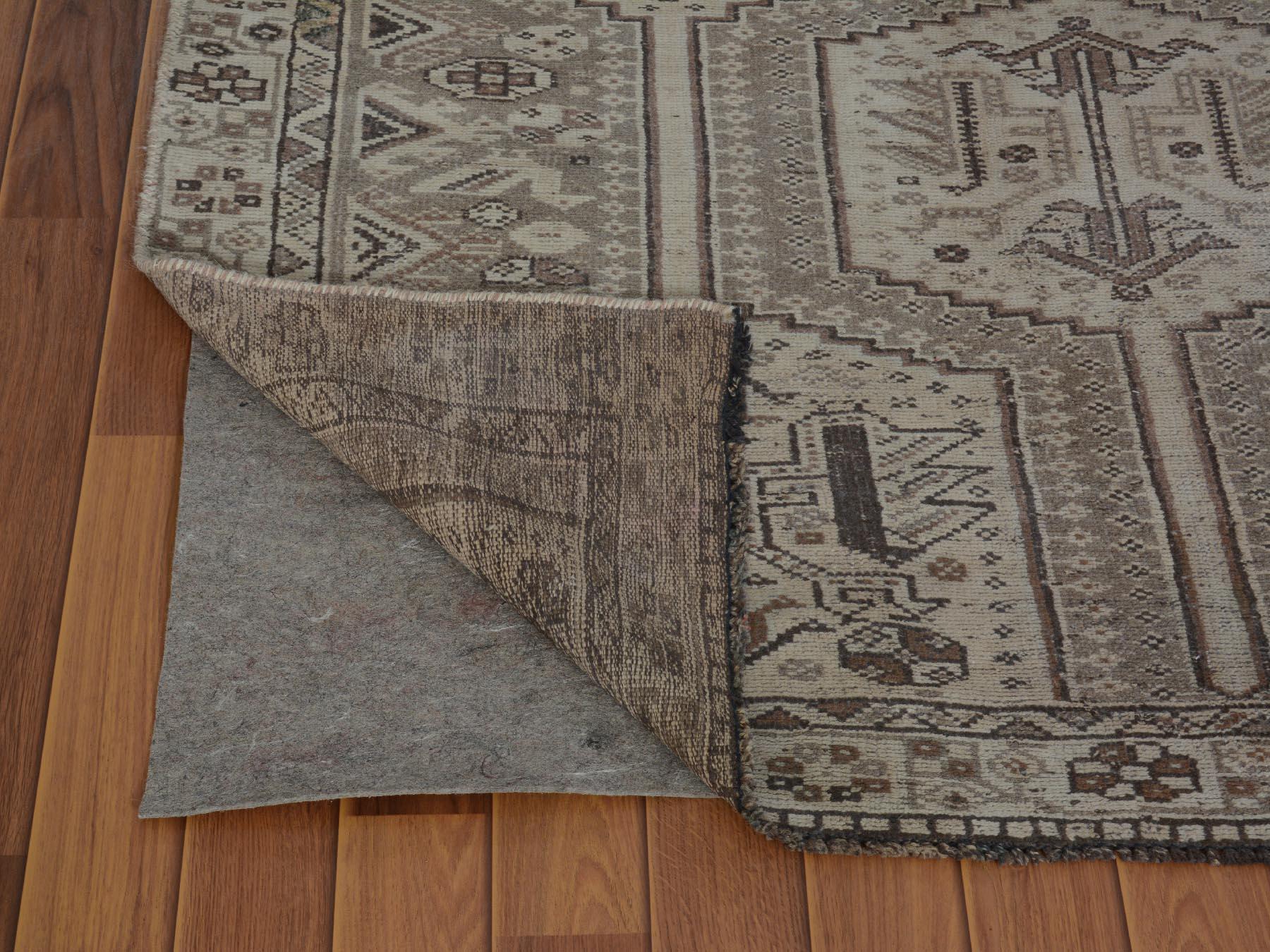 Medieval Earth Tone Colors Vintage and Worn Down Persian Shiraz Hand Knotted Oriental Rug For Sale
