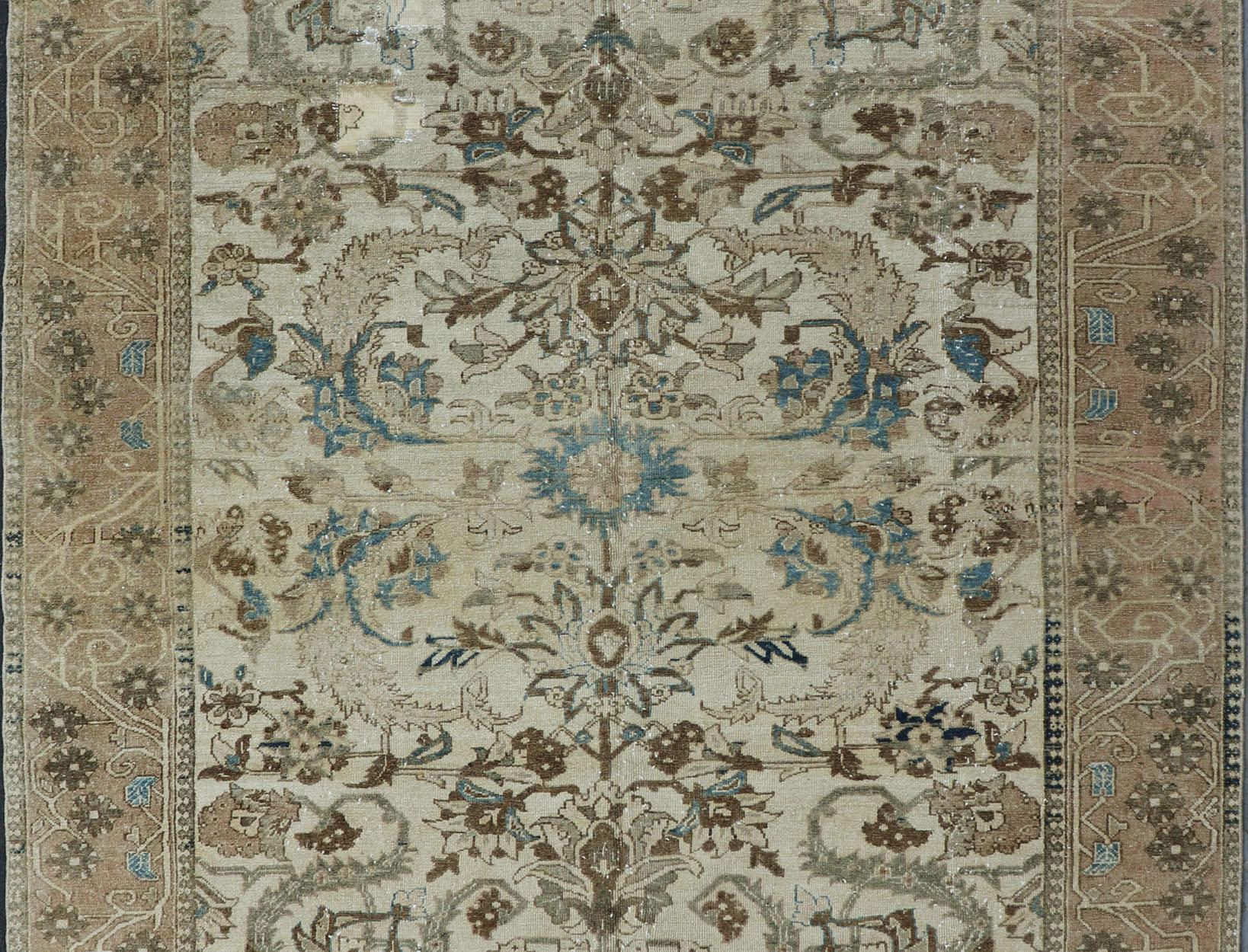 Vintage Persian Bakhtiari rug with all-over blossom design in earth tones, rug PA-1052-ks, country of origin / type: Iran / Bakhtiari, circa 1930.

Persian Bakhtiari rugs are in fact tribal pieces that rely upon a repertoire of abstract geometric