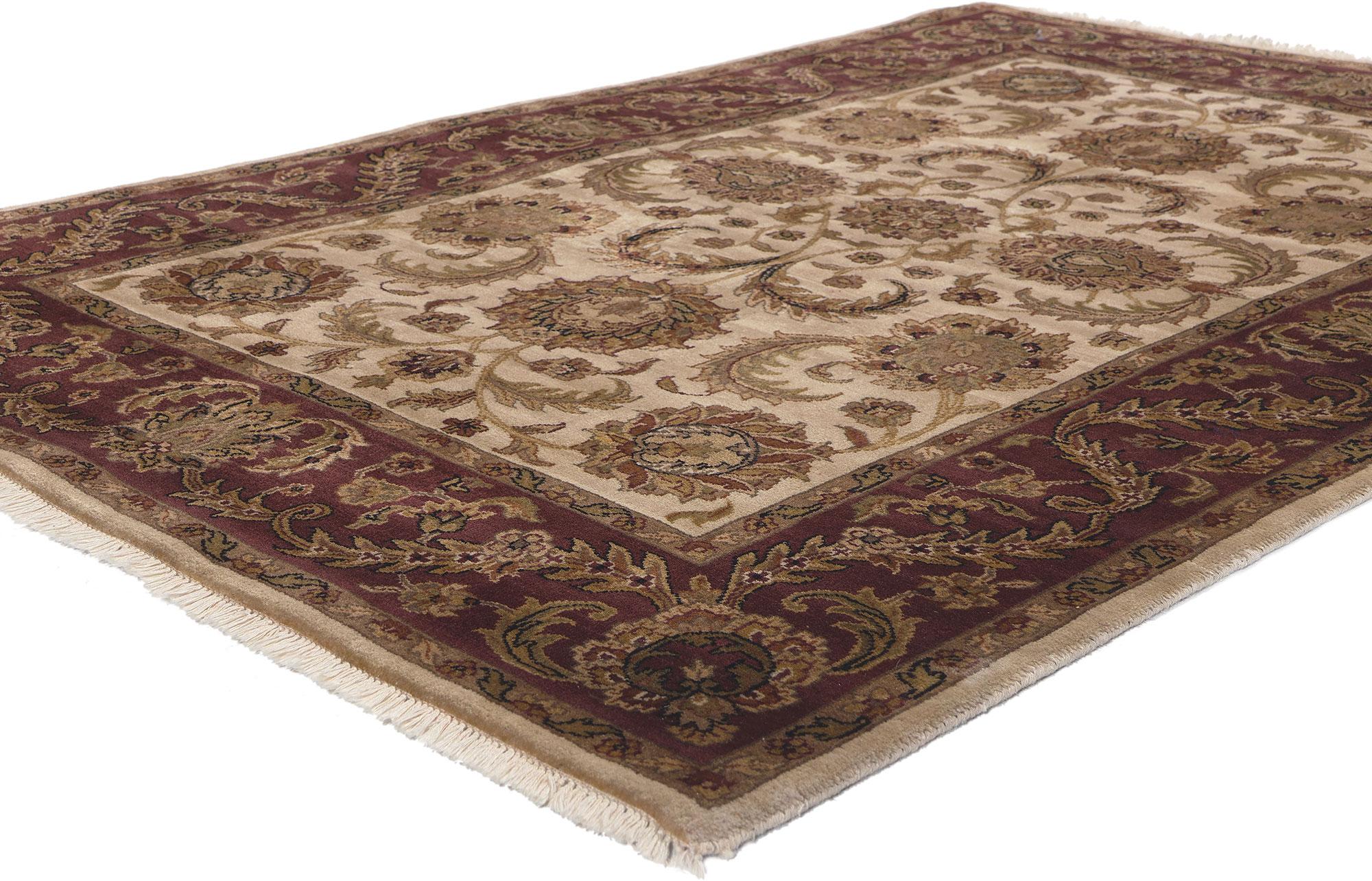 78692 Earth-Tone Vintage Indian Rug, 04'01 x 06'01.  Immerse yourself in the enduring charm of Biophilic Design and the intricate decorative craftsmanship showcased in this hand-knotted wool vintage Indian rug. Seamlessly blending captivating