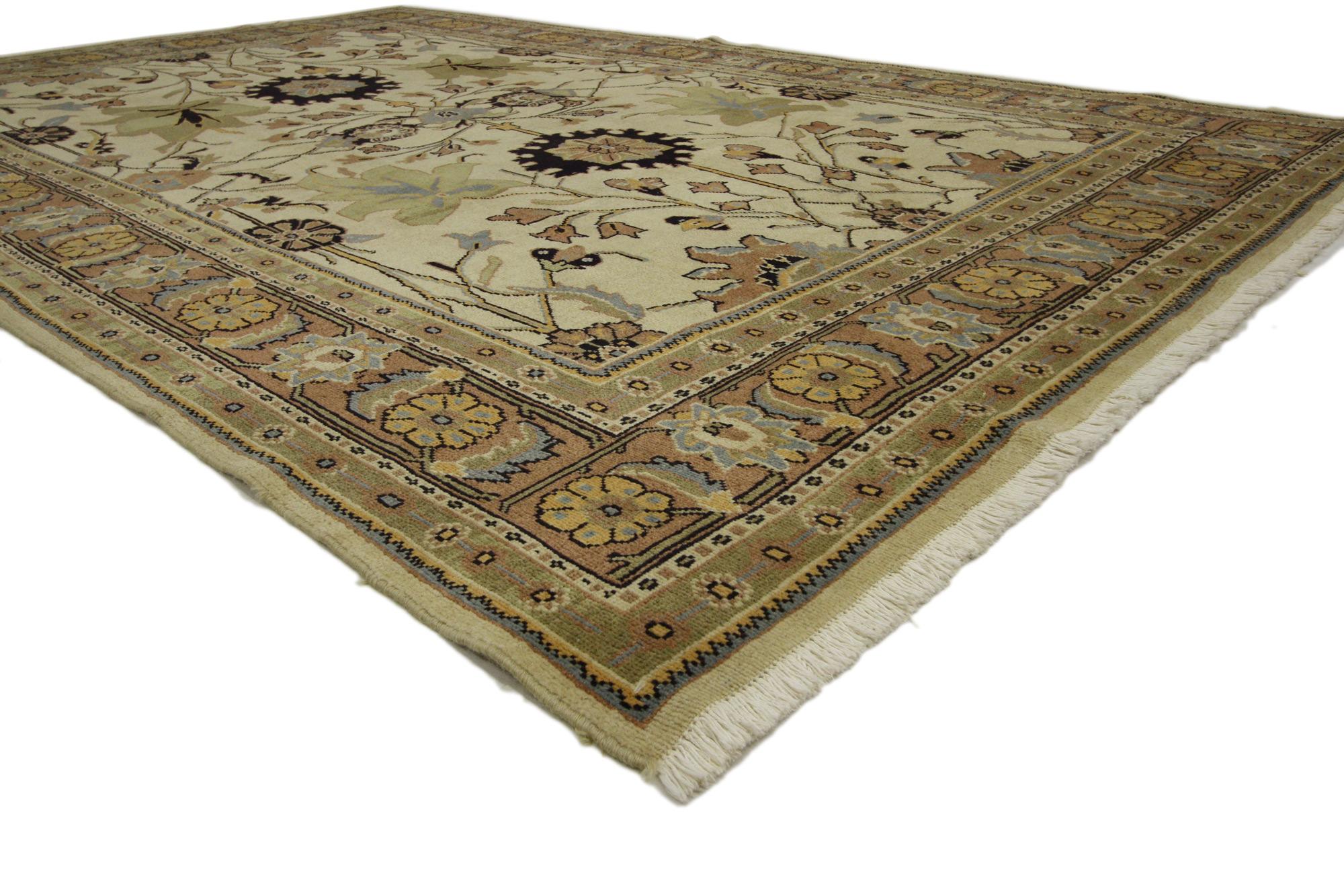 75085 Vintage Persian Mahal Rug 06'08 X 10'05.
This vintage Persian Mahal rug bears a remarkable air of chic sophistication with its modern traditional style. A beautiful display of large scale motifs delicately woven as if they are floating in the