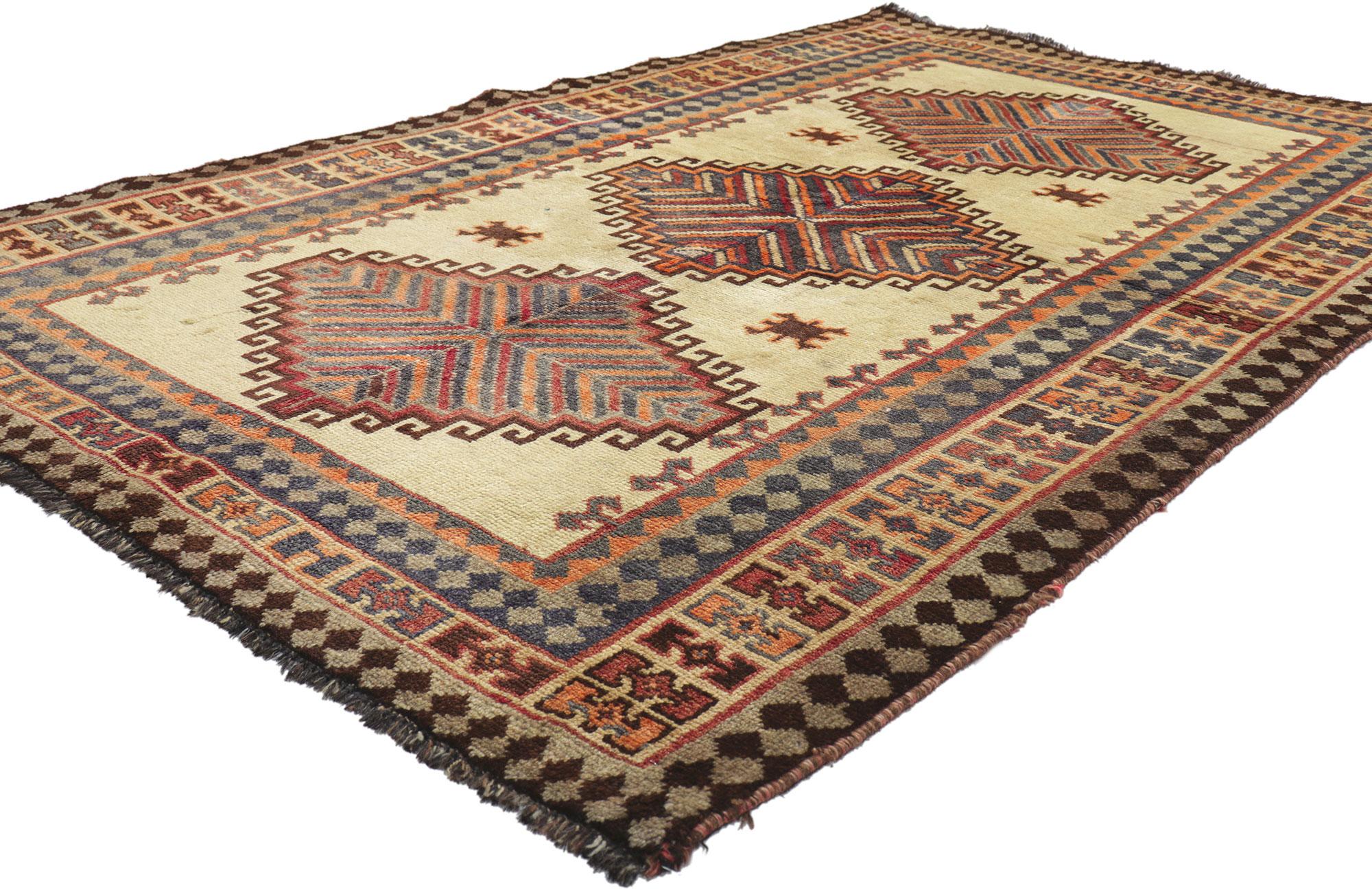 75070 Vintage Persian Shiraz Tribal Rug, 04’04 x 07’00.
Emanating nomadic charm with incredible detail and texture, this hand knotted wool vintage Persian Shiraz rug is a captivating vision of woven beauty. The striking geometric tribal design and