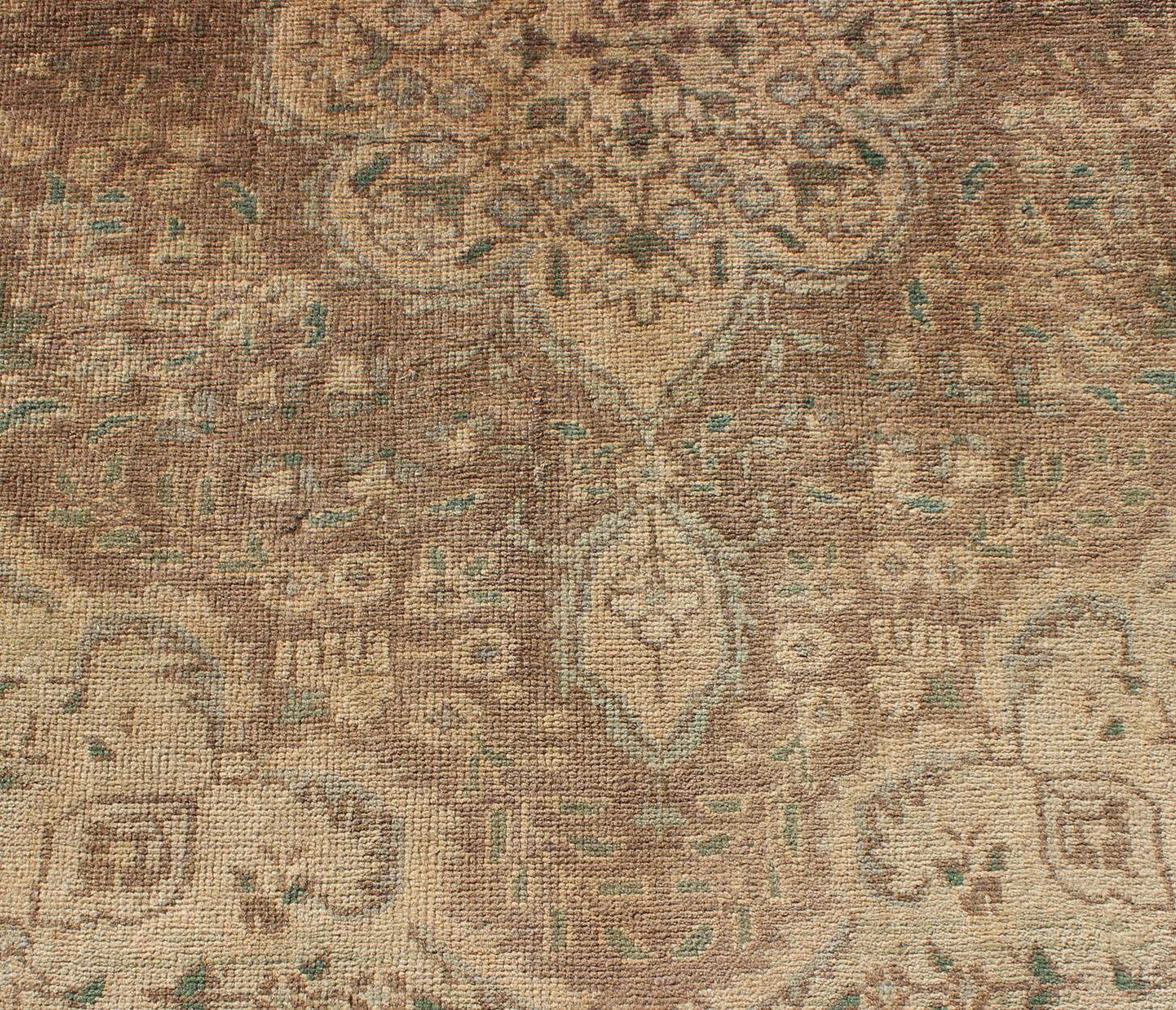 Lana Tappeto Tabriz persiano vintage in tonalità terra con motivo a vortice e medaglione in vendita