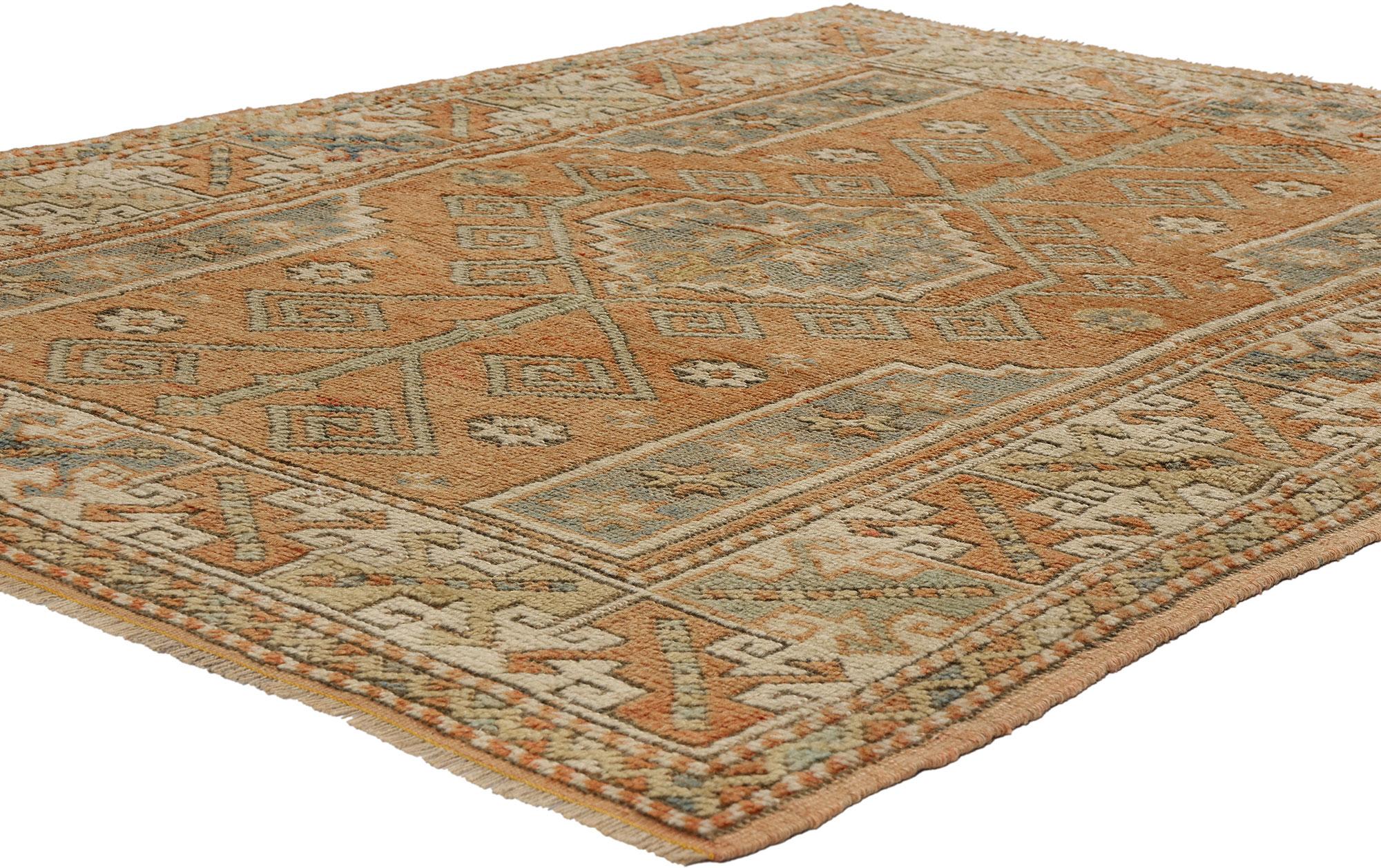 53901 Vintage Orange Turkish Oushak Rug, 04'04 x 05'08. Blending rustic Bohemian allure with nomadic charm, this hand-knotted wool Turkish Oushak rug enthralls with its earthy tones and intricate tribal motifs. Anchoring its design is a captivating