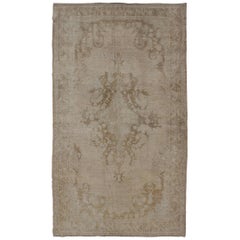 Earth-Toned Vintage Turkish Oushak Rug with Floral Medallion Design