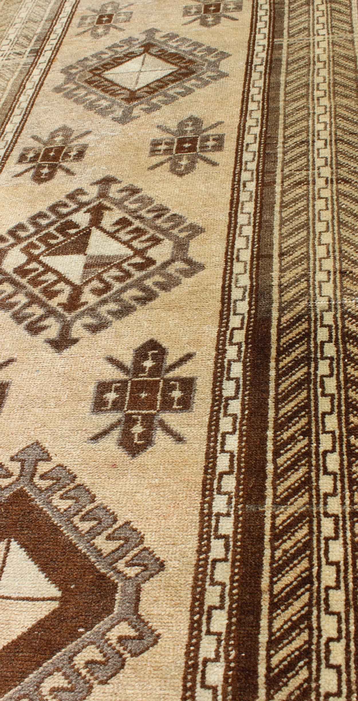 Earth-Toned Vintage Turkish Oushak Runner with Stacked Medallion Design For Sale 4