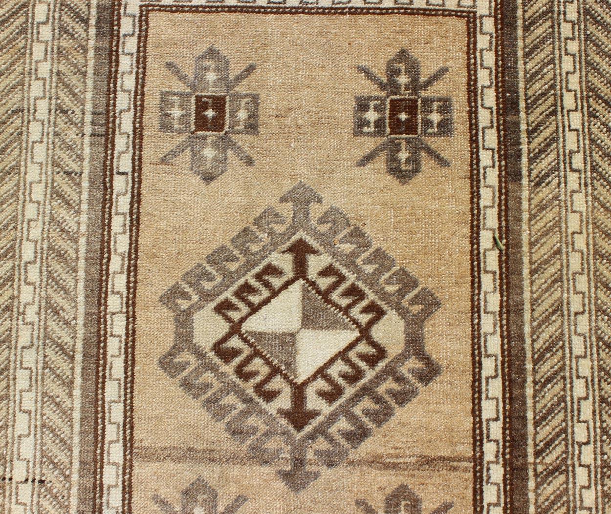 Earth-Toned Vintage Turkish Oushak Runner with Stacked Medallion Design For Sale 2