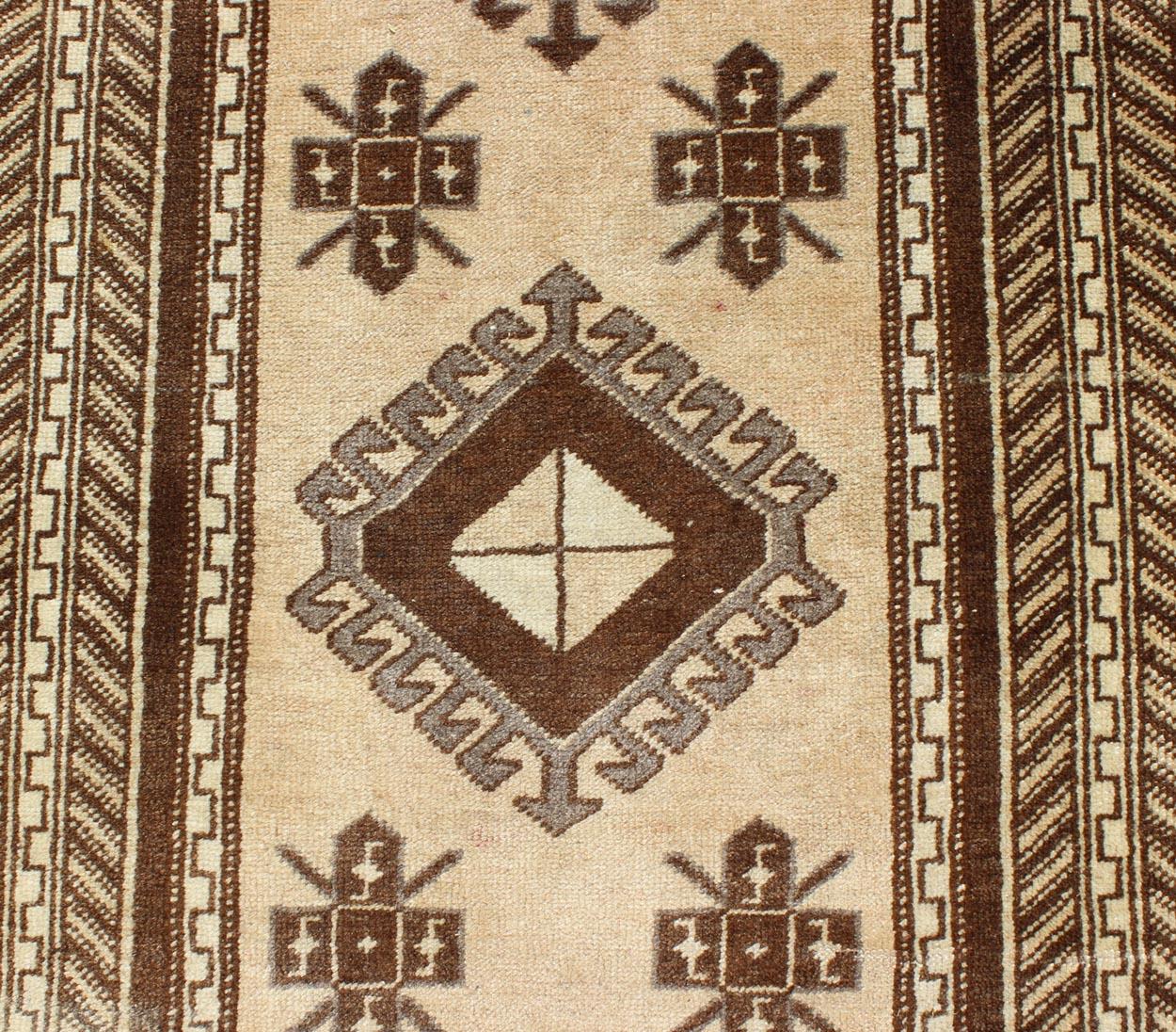 Earth-Toned Vintage Turkish Oushak Runner with Stacked Medallion Design For Sale 3