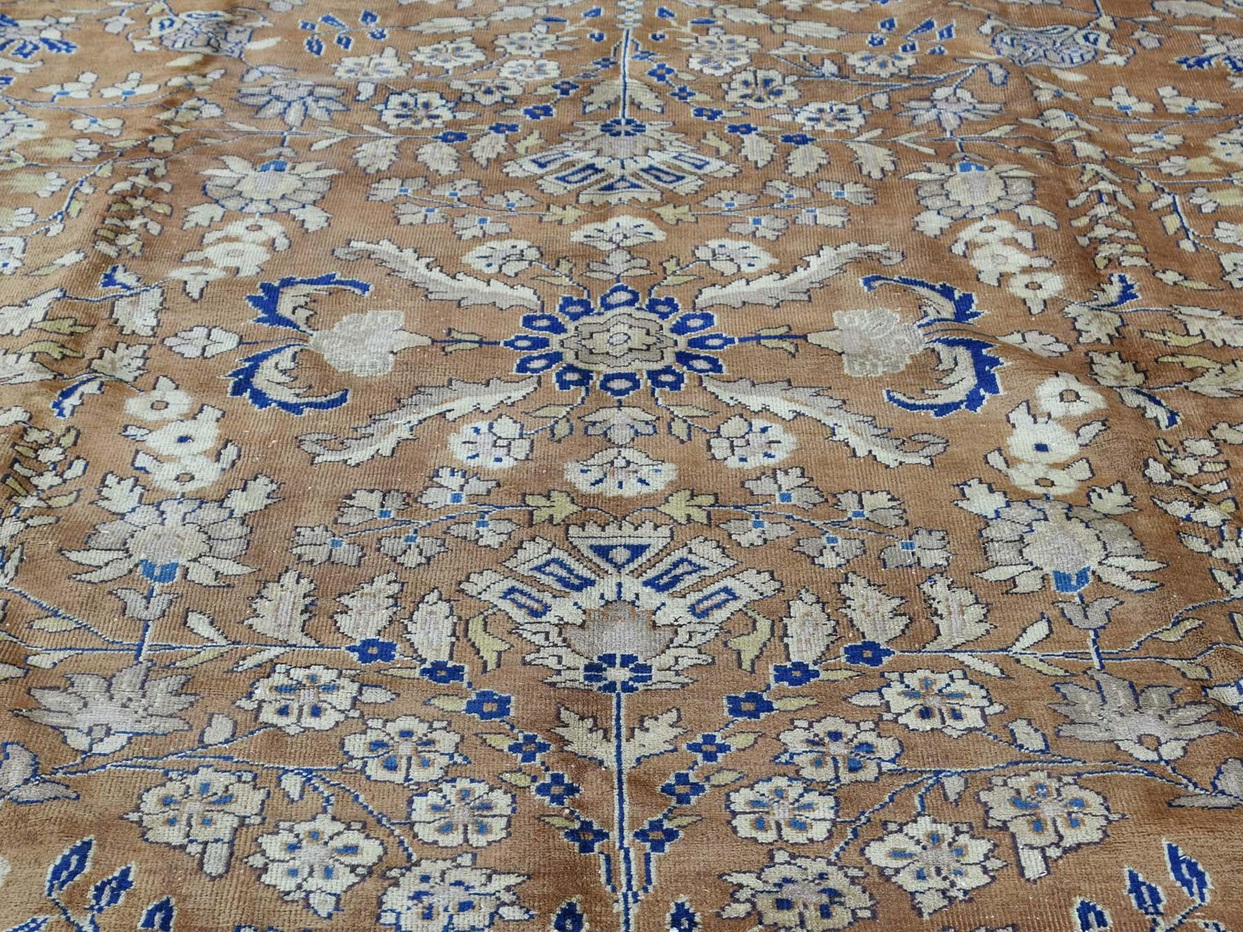 This is a genuine hand knotted Oriental rug. It is not hand tufted or machine made rug. Our entire inventory is made of either hand knotted or handwoven rugs.

Enhance your home with this magnificent hand knotted carpet. This handcrafted antique