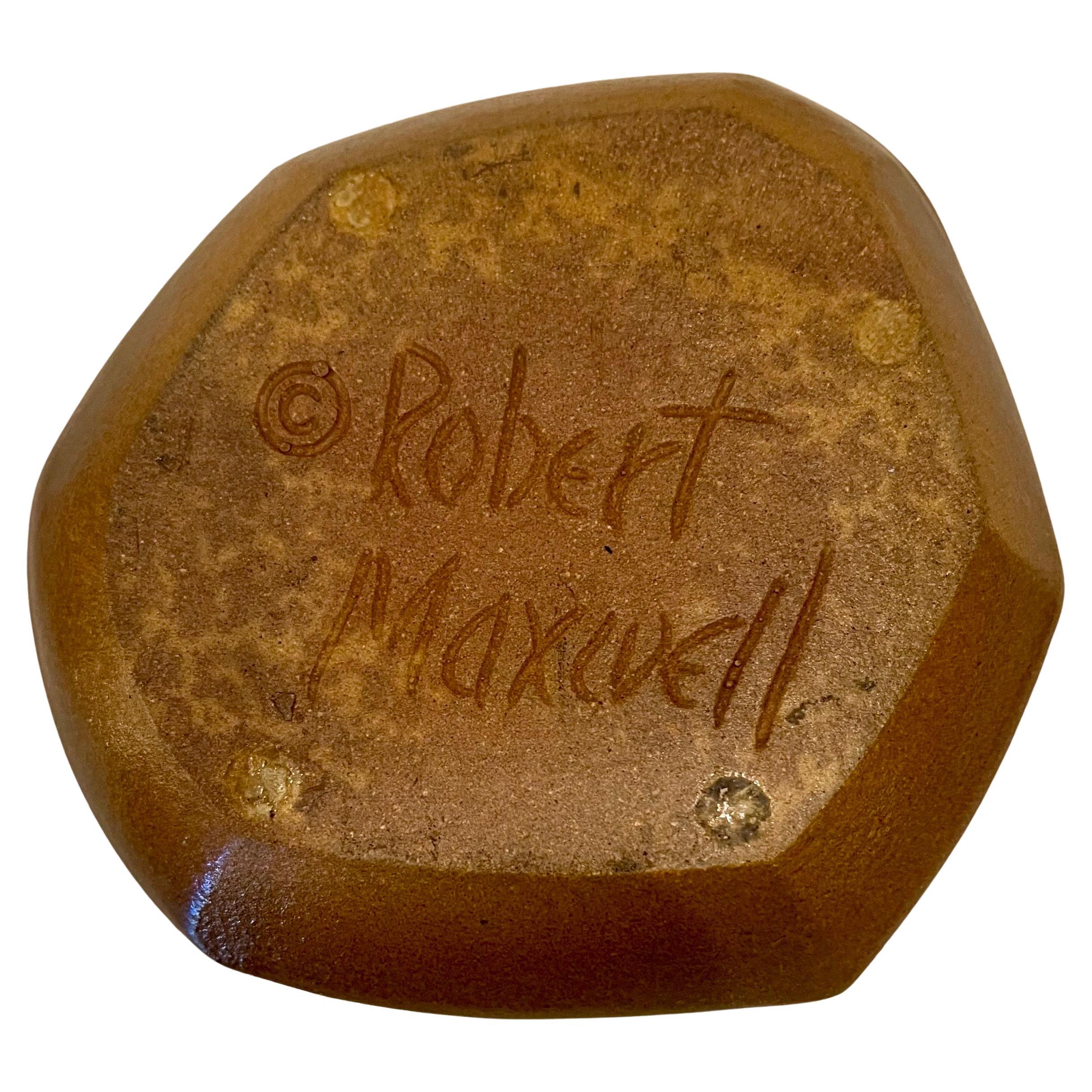 A wonderful earthenware ashtray with green crackled glass in the center signed by Robert Maxwell, circa 1970s. The piece measures 6