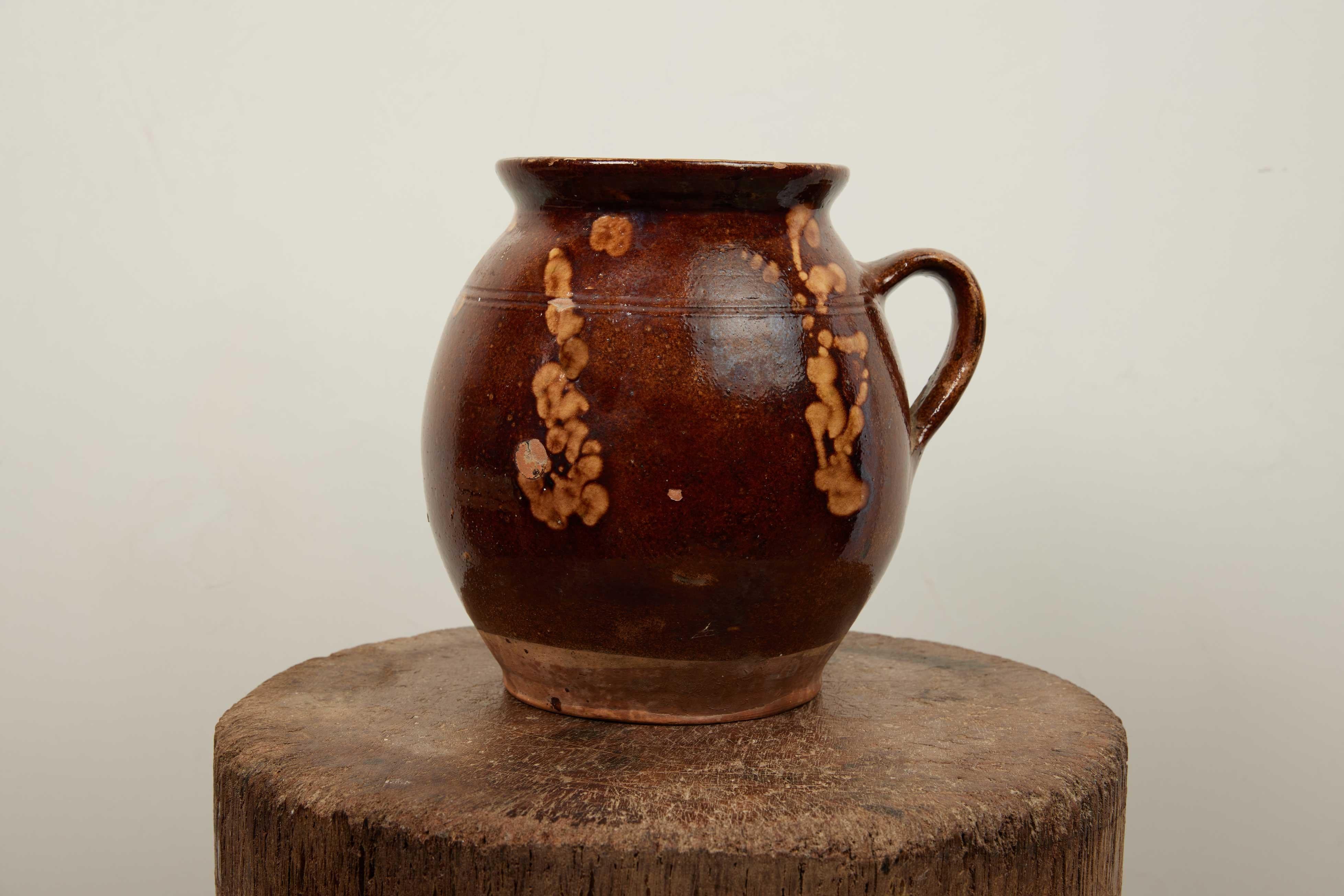 Earthenware Hungarian Pottery, circa 1900s


This 19th-century glazed dark brown Hungarian pottery piece is a charming 10