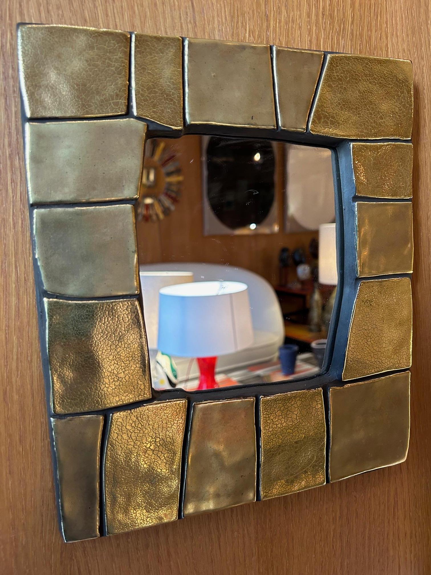 Gold enameld earthenware mirror by Mithé Espelt, Cuzco Model created in 1974