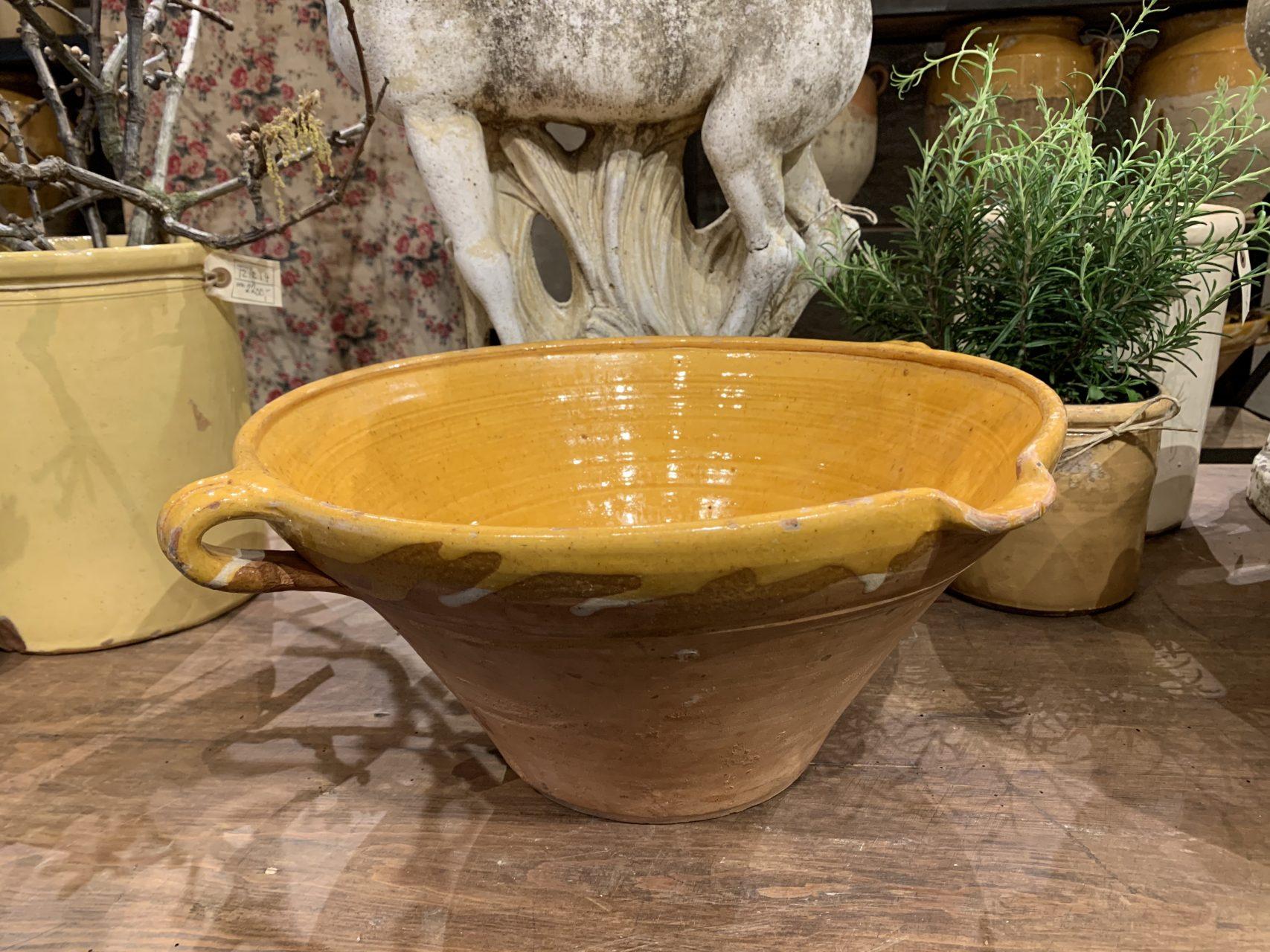 Wonderful and rustic, yet quality vintage French clay dish, known as a “Tian”. Used in food making and storage, is designed with handles, pouring spout, and a stunning characteristic beautiful curry yellow glazed inner and brim and raw clay