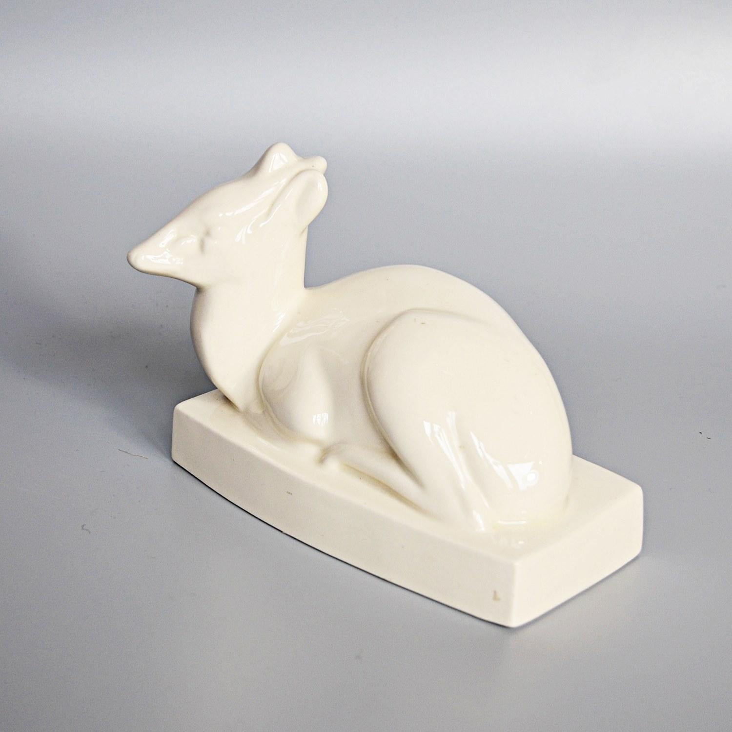 An earthenware model of a Duiker by John Skeaping for Wedgwood. Cream glazed with printed Wedgwood marks to underneath. 

Dimensions: H 12cm, W 18cm, D 10cm 

Origin: English

Date: circa 1960

Item number: 2409205.