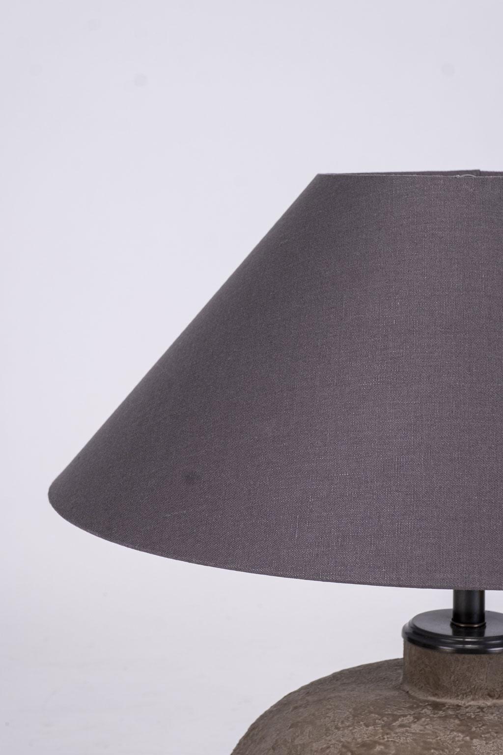 Earthenware table lamp with linen shade (listed measurements include shade). Newly wired for use within the USA using UL listed parts.