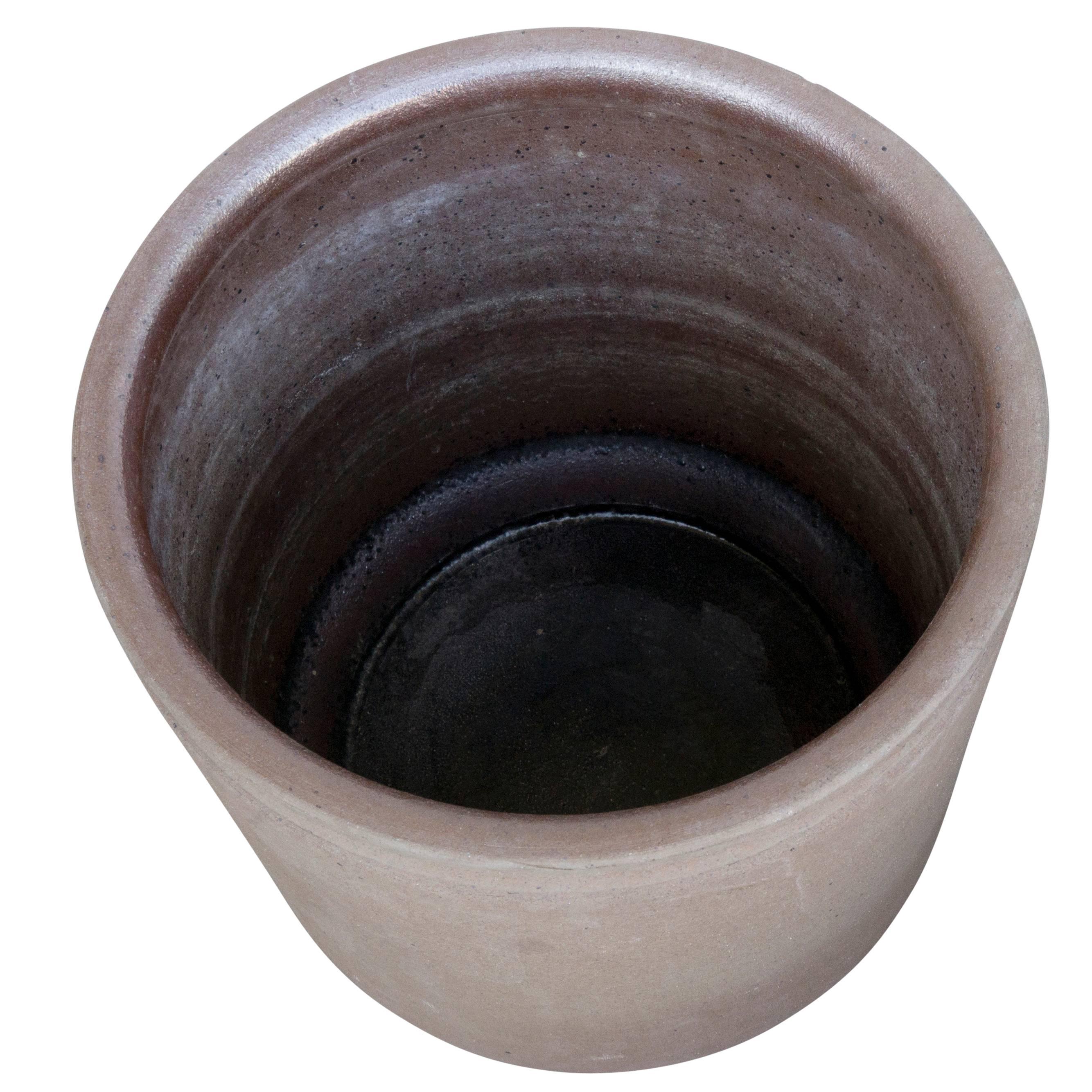 Robert Maxwell style vessel as seen in the signature incised top rim. Earthgender known for its warm deep earth-tones is a great addition to most interior and exterior design styles, combining natural colors with modern techniques of pottery