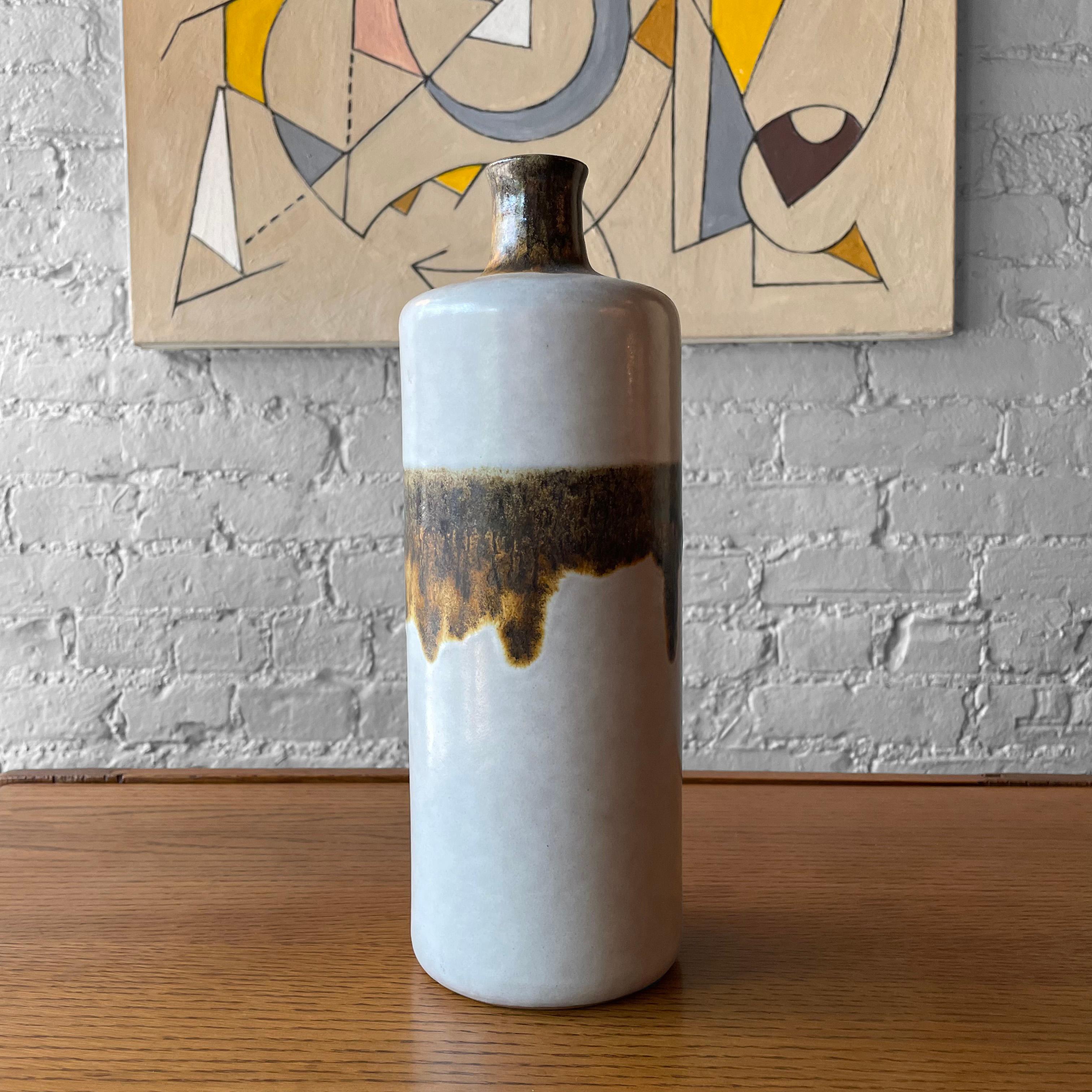 Italian, Mid-Century Modern, art pottery vase by Alvino Bagni for Raymor features an earthen tone drip glaze with a 1 inch opening.