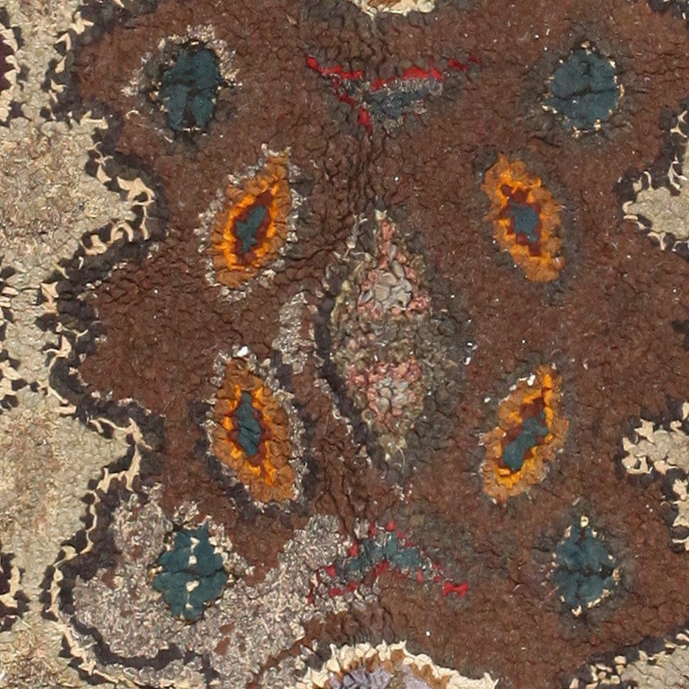 Earthy Antique American Hooked Rug. Size: 6 ft 6 in x 8 ft 9 in  In Excellent Condition In New York, NY