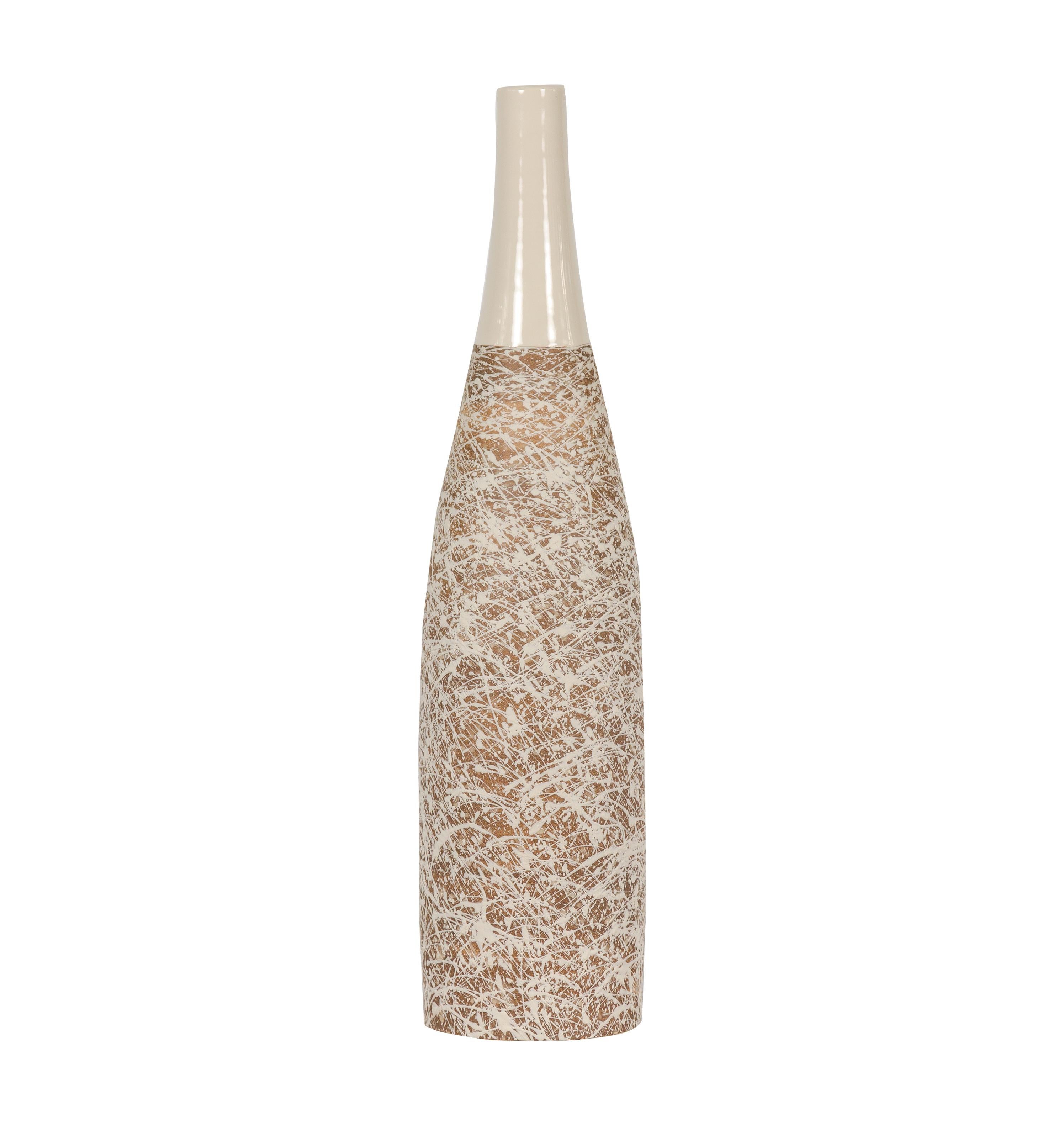 Voici un vase captivant en céramique crème, mélange harmonieux d'art moderne et d'inspiration naturelle. La base du vase est enveloppée d'un ton brun terreux plus profond, créant une base riche et organique. De cette terre, des gouttes énergiques