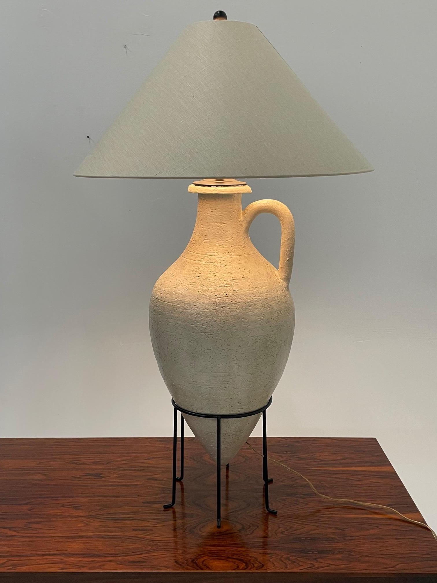 Sculptural painted pottery Grecian style urn lamp having custom metal stand. Shade is not included unless extra cost for shipping. The one shown is linen.