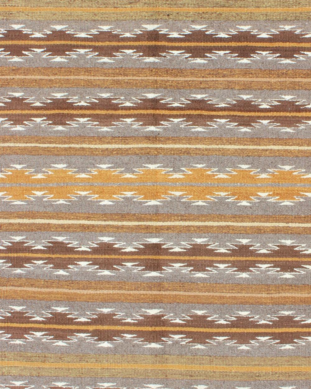 American Earthy Tones USA Navajo Kilim rug with Black Border Tribal Design For Sale